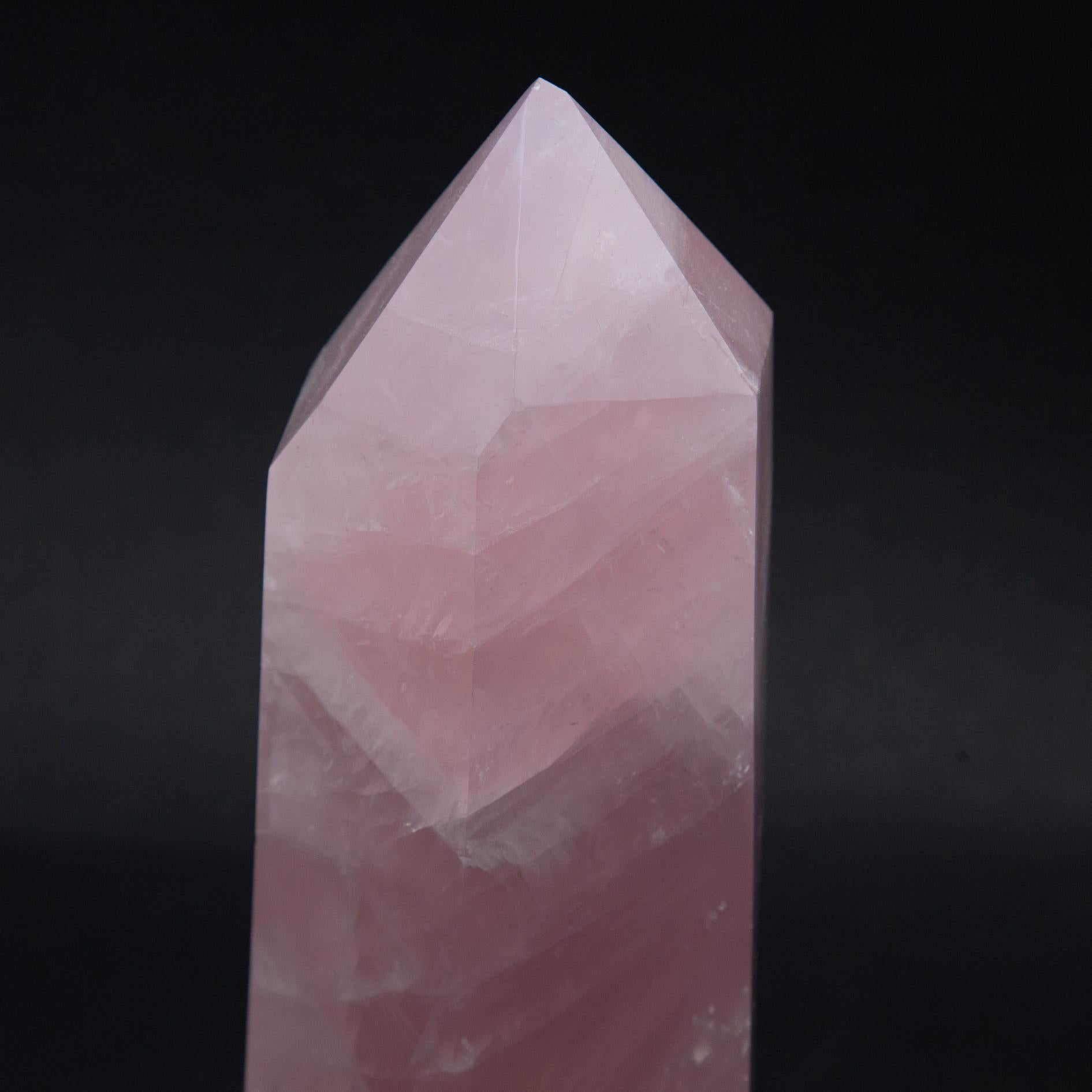 Hand carved rose quartz point. Measures: ~4