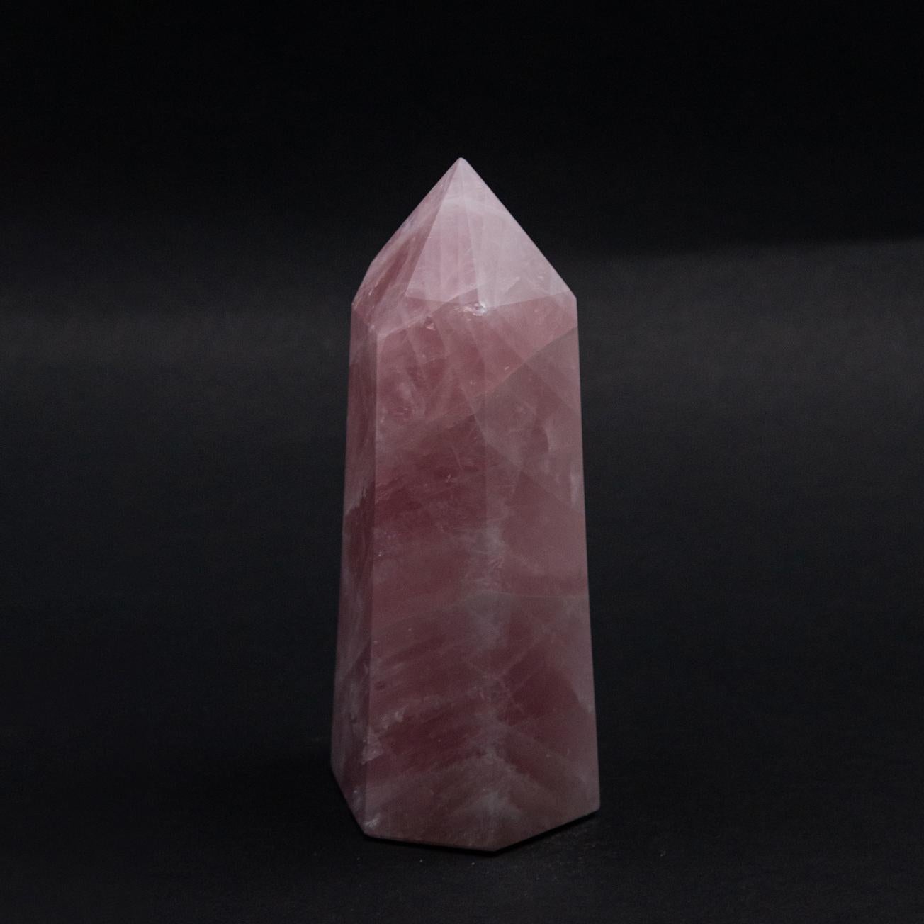 Hand carved rose quartz point. Measures: 6.5