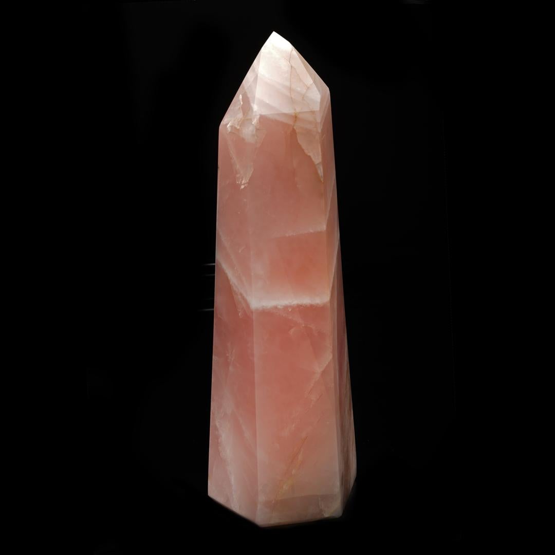 This dramatically dimensioned six-sided tower has been expertly hand-carved and hand-polished out of the finest color rose quartz available – sourced from Brazil and perfect as a statement piece to make an impact in any room in your home or office