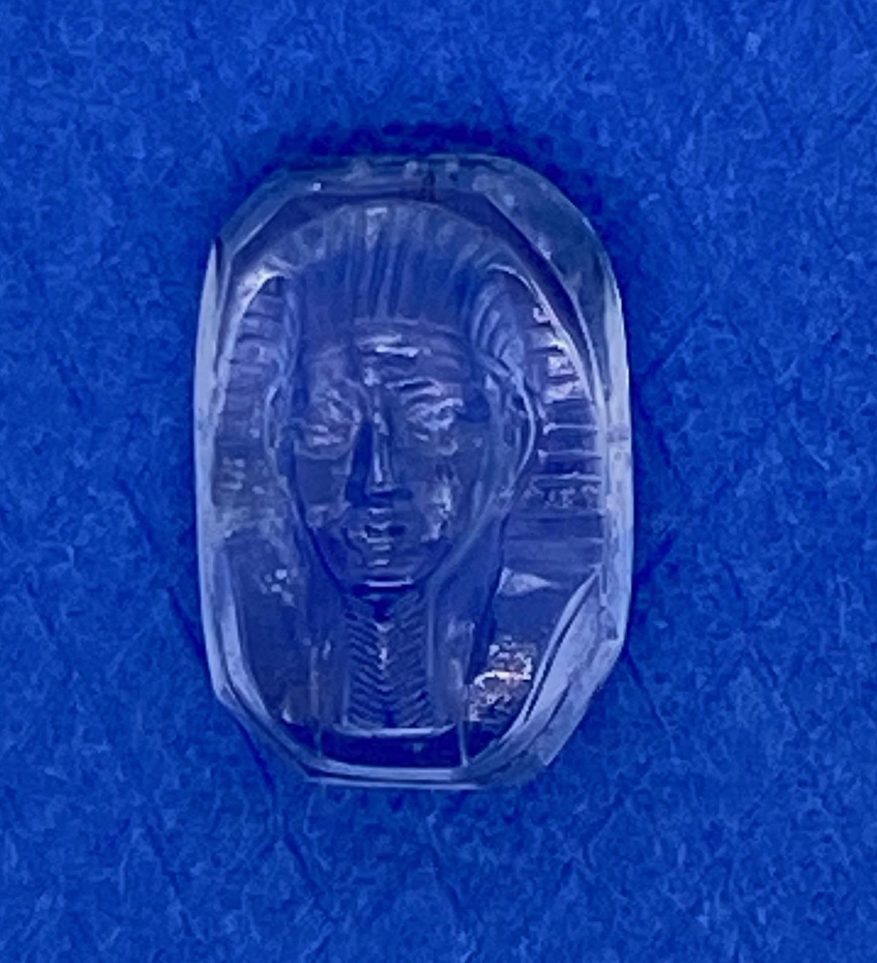 From the Castellani® Collection of Carved Gemstones is a finely detailed cushion shape Sapphire Cameo of a Pharaoh's Sarcophagus.=7.95ct
This hand carved sapphire cameo is of the 