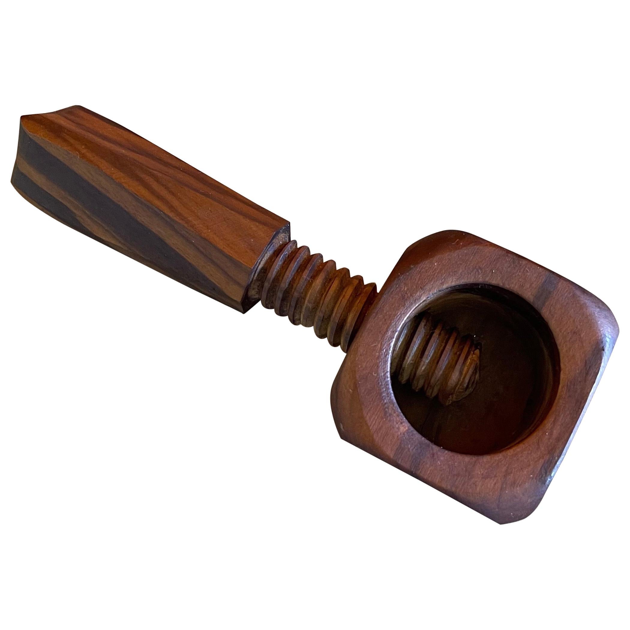 Hand Carved Screw Type Nut Cracker in Walnut For Sale
