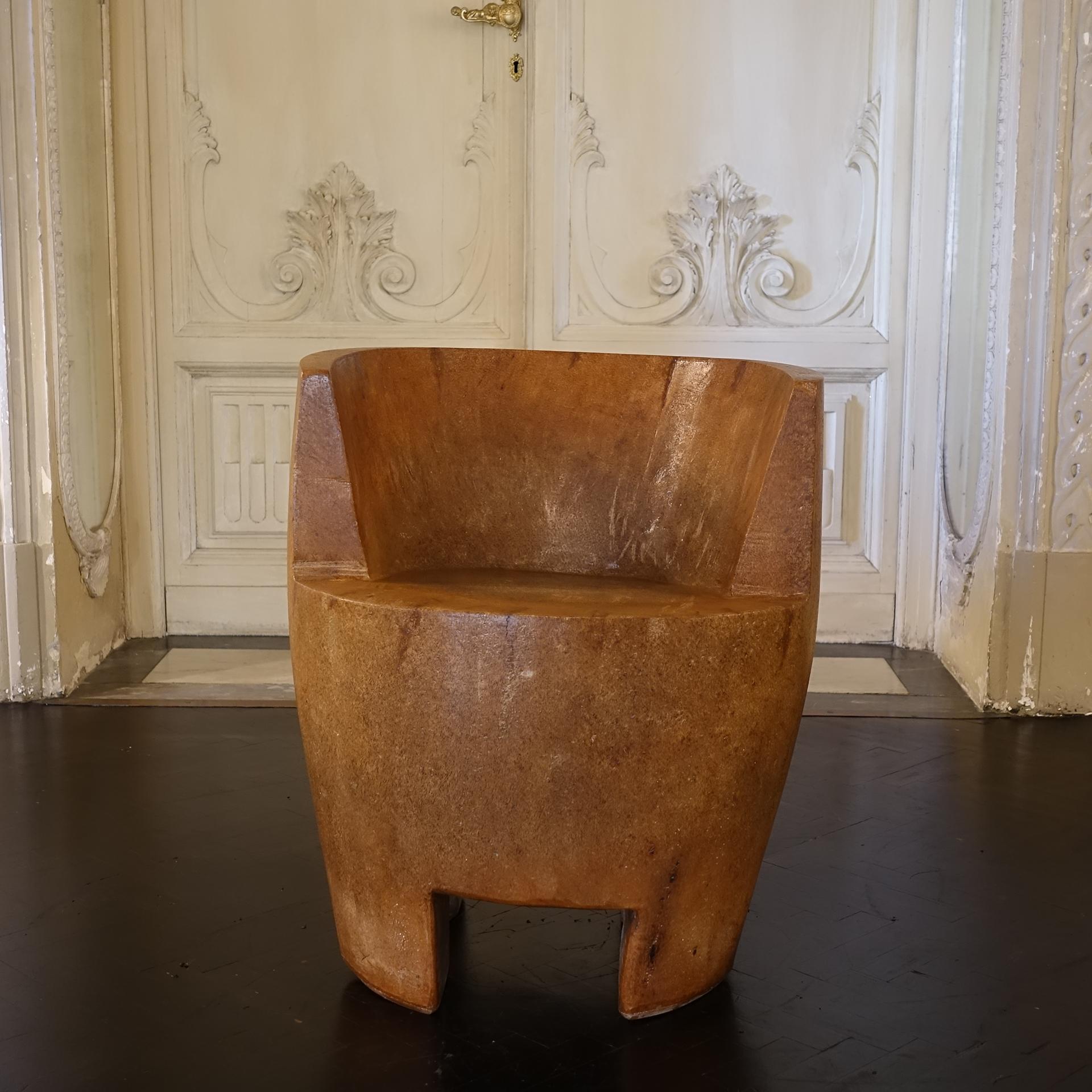 Contemporary hand carved tree stump African chair, perfect for sitting and holding space, decoratively or functionally.