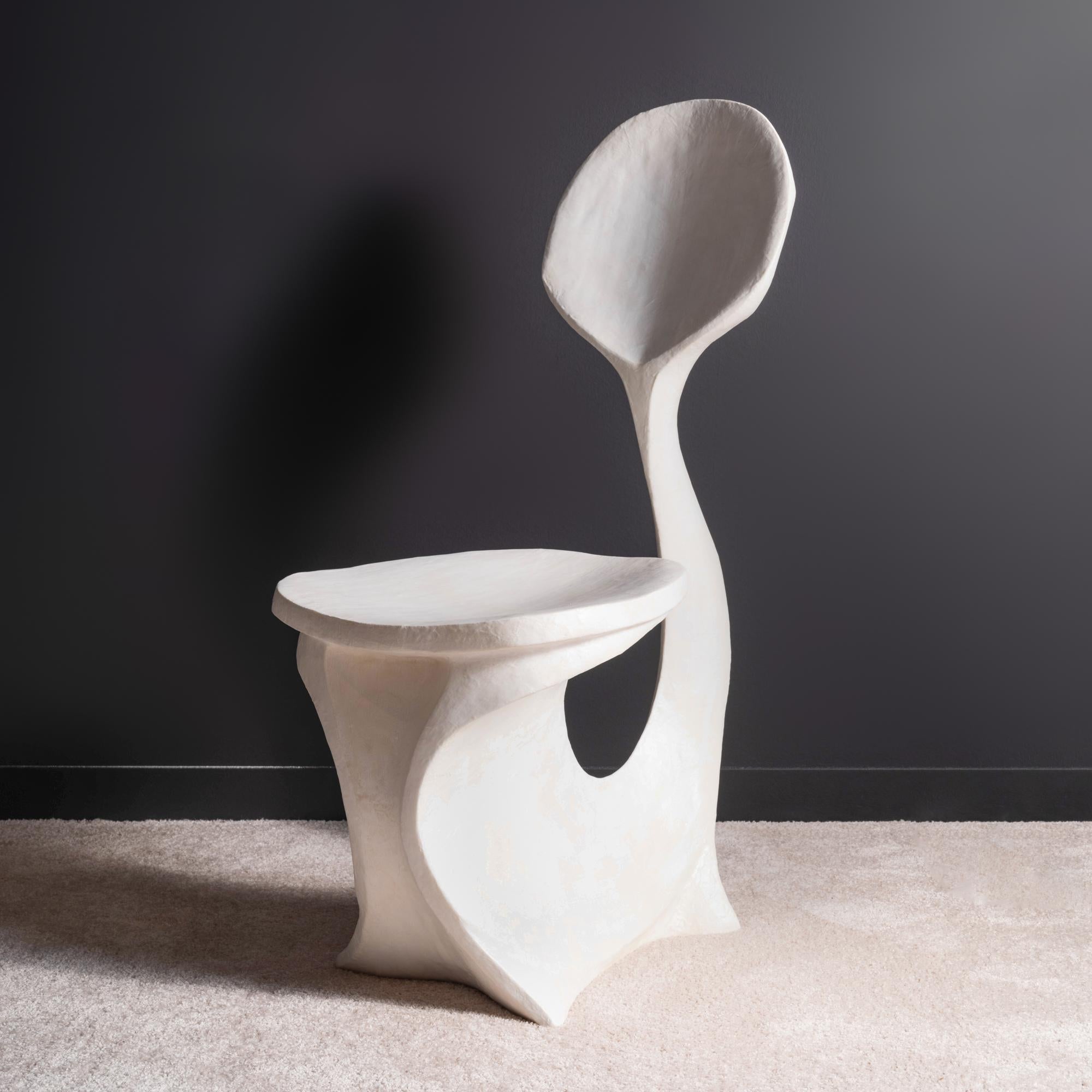 One-of-a-kind, sculptural chair finished in milky white laminated washi paper, hand-made by Simone Bodmer-Turner in 2023. Known for graceful and poetic work that balances in between functional and artistic, Bodmer-Turner's 