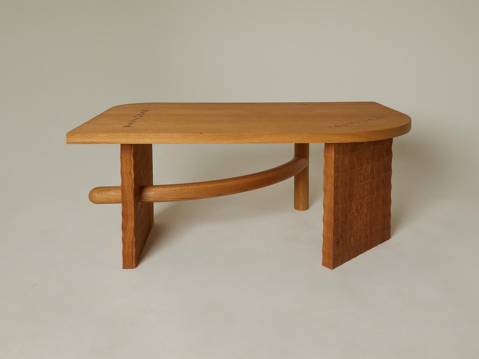The Object System Series by Nathaniel Wojtalik takes industrialized forms and distills them through a lens of traditional craft. 

The base of the Sabbagh Billot table is attached by a series of intricately hand cut tenons that pass through the top,