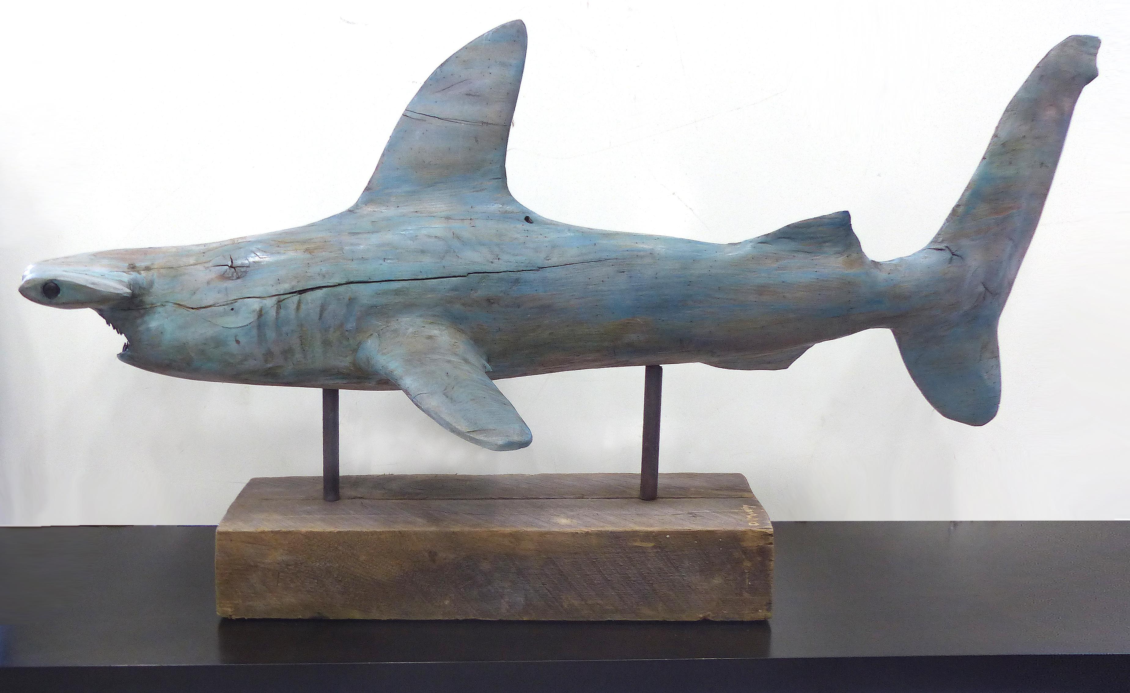 Davis Murphy hand carved sculpture of a Hammerhead Shark, 2018

Offered for sale is a life-size hand carved sculpture of a hammerhead shark by Florida born artist Davis Murphy. The sculpture is carved from Carolina red oak, has glass eyes and
