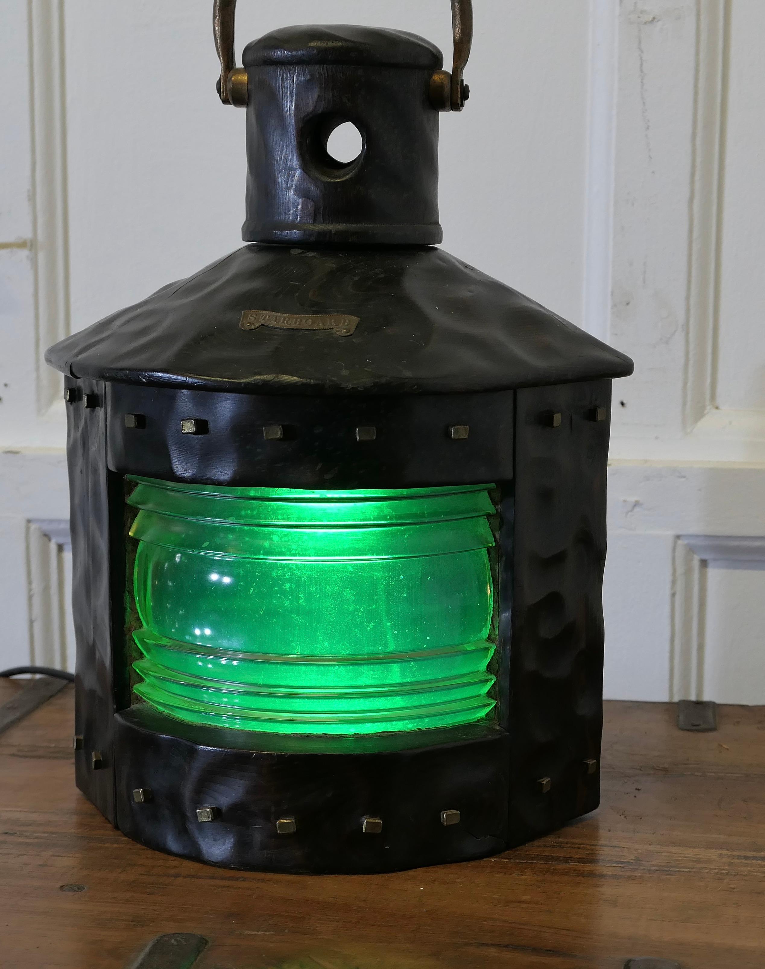 Hand Carved Ships Starboard Navigation Light.

The lamp is flat sided with an original bowed and ridged glass front
A great decorators piece the lamps is made in wood it is fully electric, a good marine theme piece and  a Lovely Porch Lantern.
The