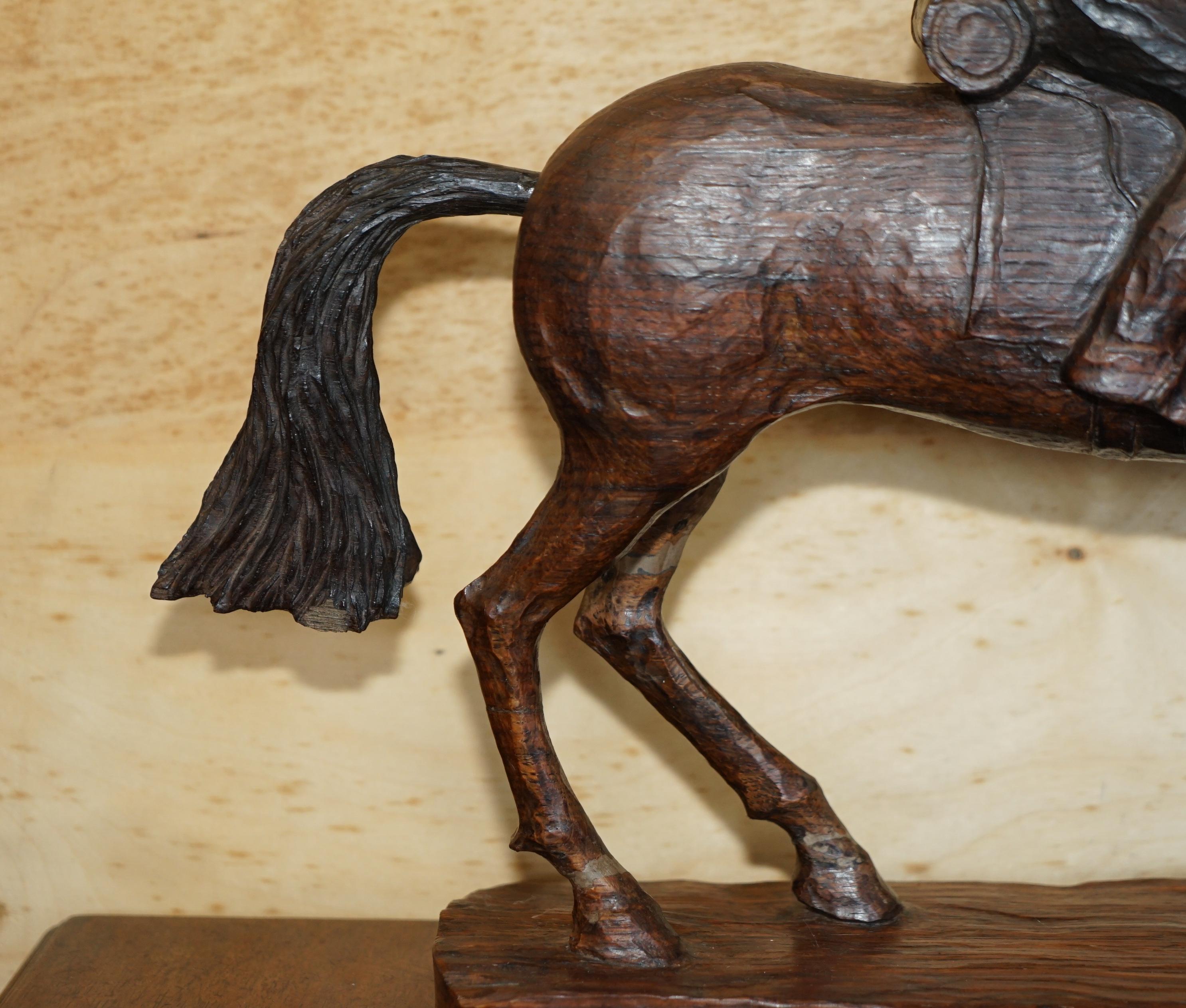 Hand-Crafted HAND CARVED SIGNED WAKMASKI 80 LARGE WOOD STATUE OF SOLDIER ON A HORSE VERY FiNE For Sale