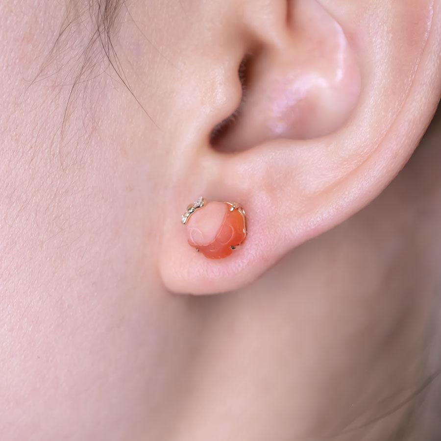 Arts and Crafts Hand Carved Skull with Diamond Bows Fire Opal Stud Earrings 18k Gold For Sale