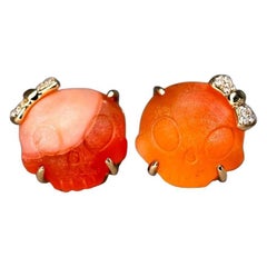 Hand Carved Skull with Diamond Bows Fire Opal Stud Earrings 18k Yellow Gold