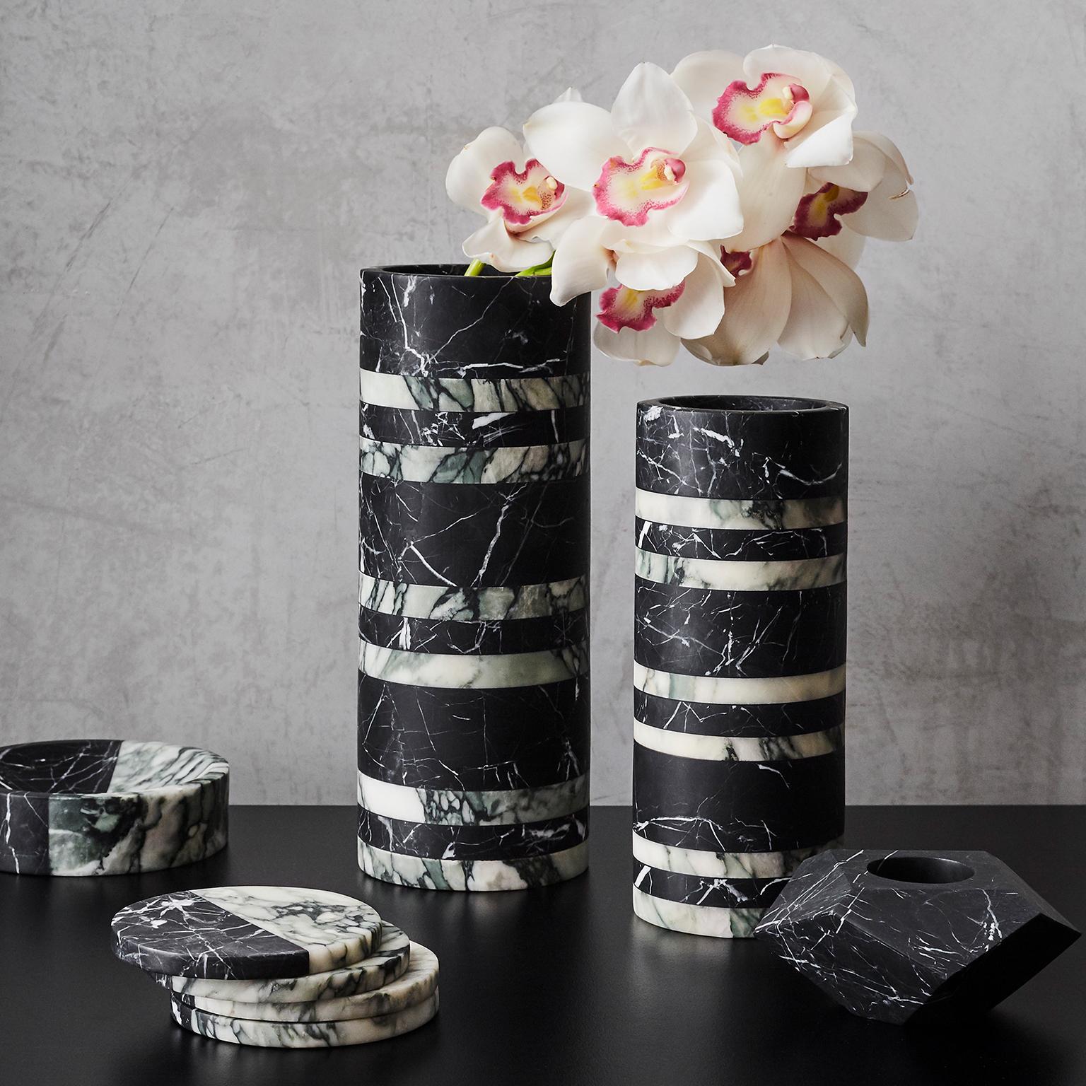 The shifting, faceted edges of this smart marble ornament lend it well to decorative use or as a tea light holder. The Gem collection of ornaments offer three sizes in a range of stones. 

Dimensions: D123 x 53 H mm
Materials: Nero