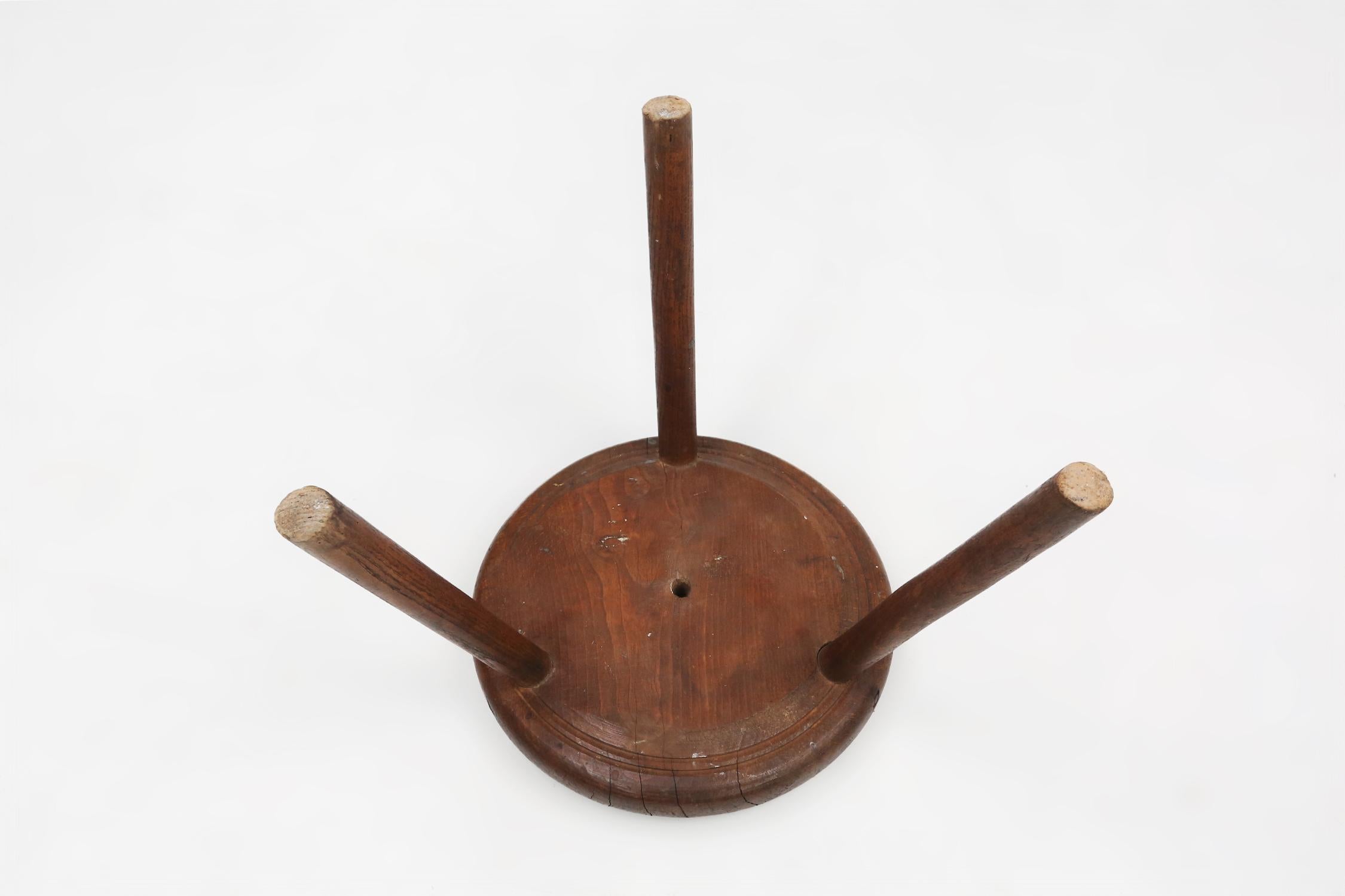 Hand-carved solid wood tripod stool with beautiful patina, France ca. 1900 For Sale 2