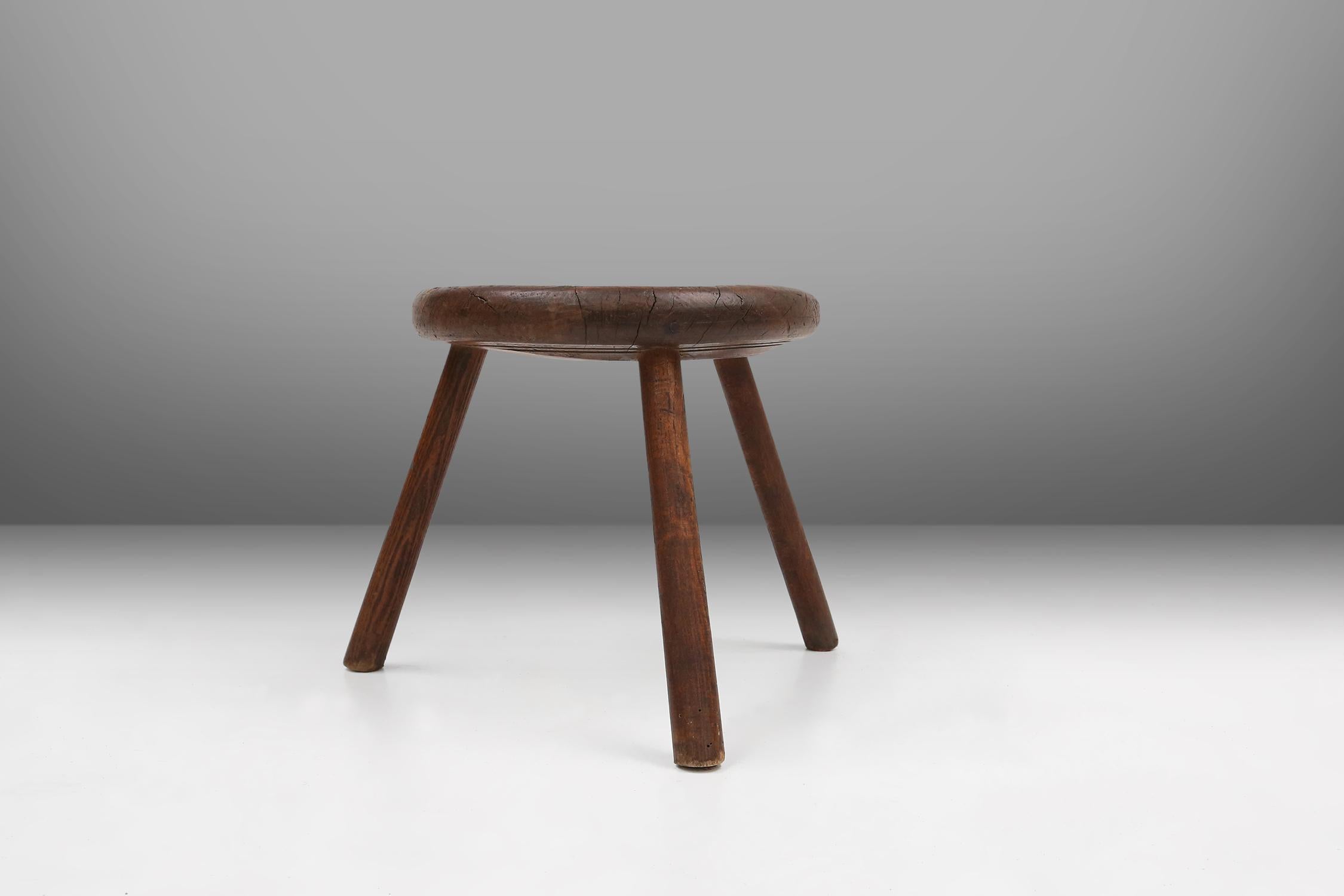 French Hand-carved solid wood tripod stool with beautiful patina, France ca. 1900 For Sale