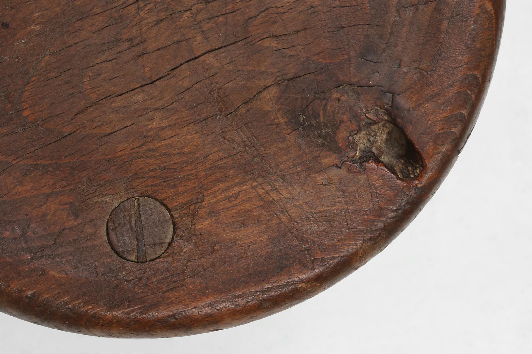 Hand-carved solid wood tripod stool with beautiful patina, France ca. 1900 For Sale 1