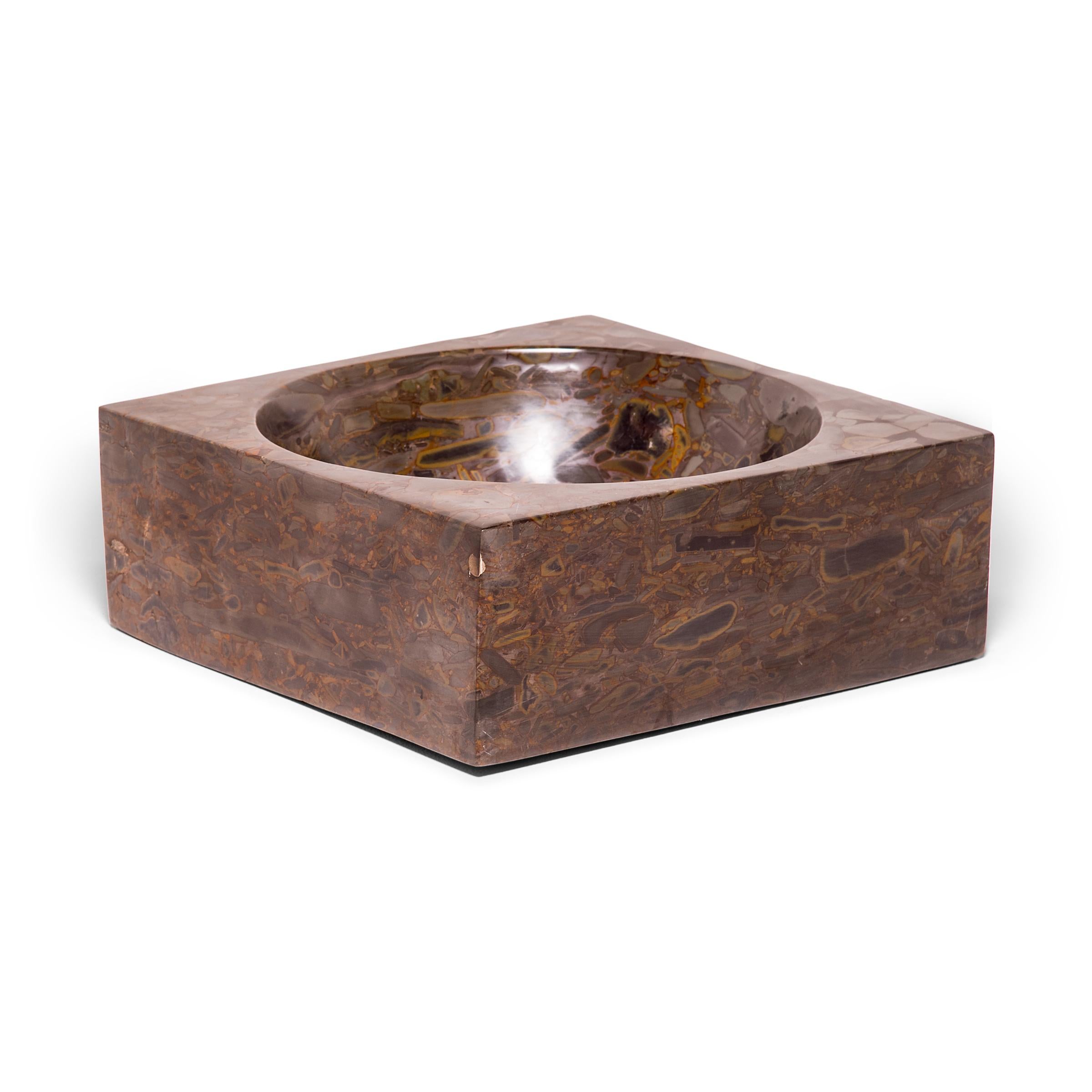 A clean-lined interpretation of an ancient form, this squared basin was hand-carved by artisans in China's Shandong province. The rounded interior and finely edged exterior offer an eye-catching combination of forms. The basin looks meticulously