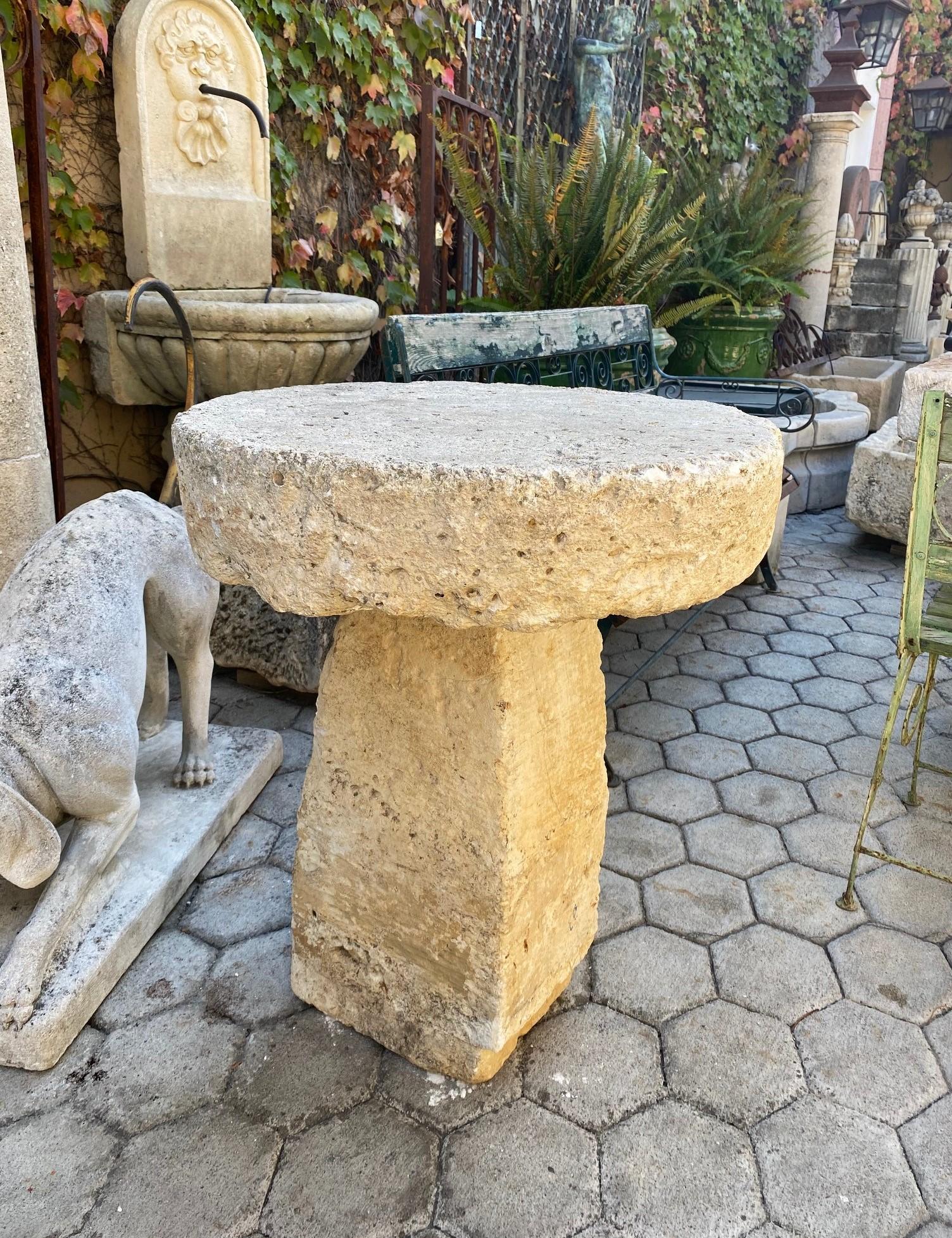 17th 18th Century elements hand carved small stone round antique garden patio coffee outdoor indoor table for two. It will be the perfect touch by an outdoor fireplace or on the patio next to your bedroom to have the morning coffee and welcome a