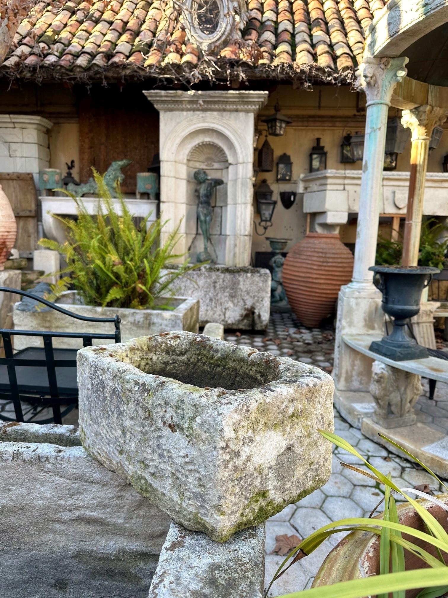 Hand carved stone container farm sink fountain trough basin planter antique LA . 18th Century water basin of hand carved stone container. Color and patina keeps changing with the light and the seasons . this trough could be installed with a simple