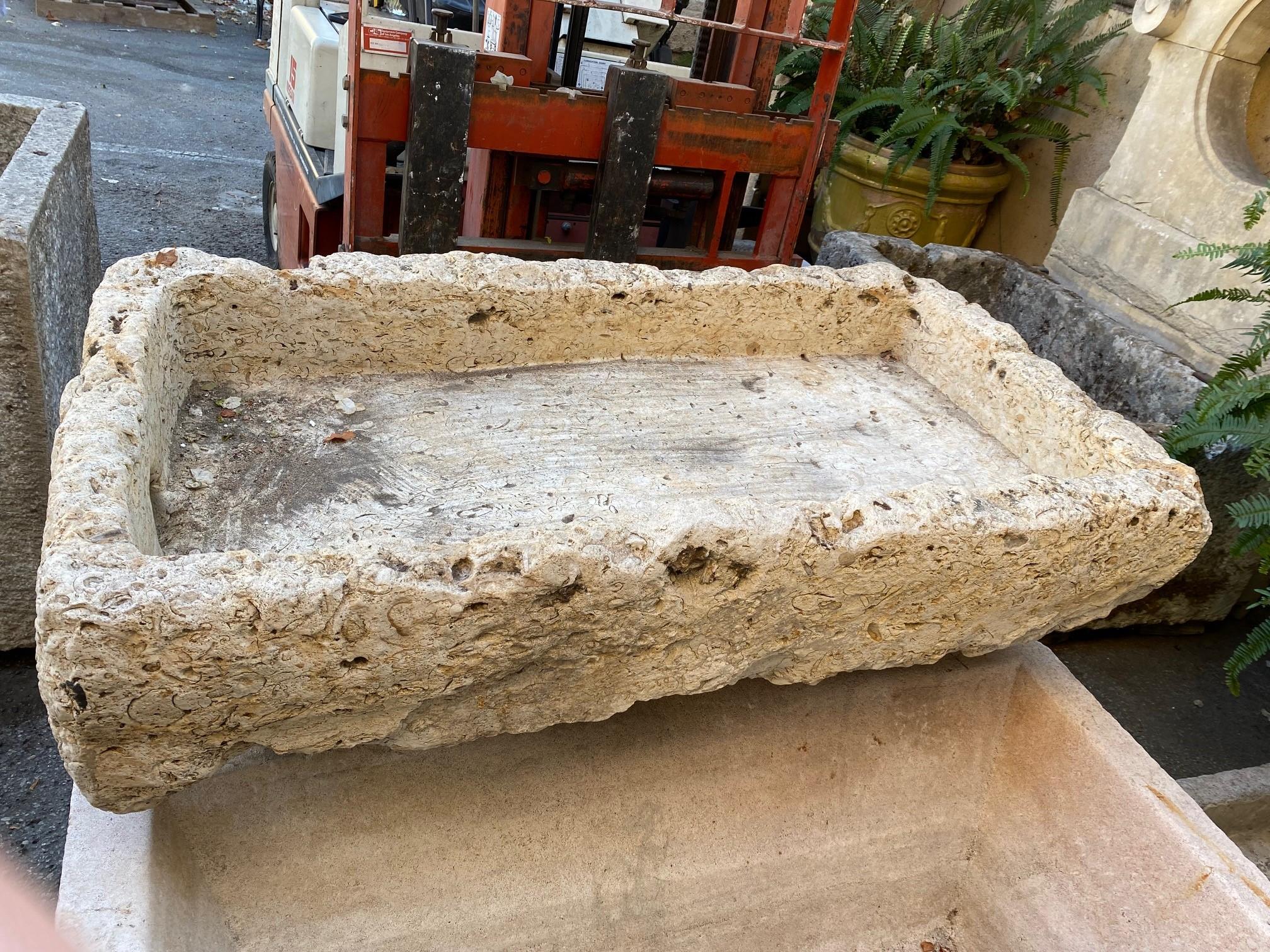 A very charming and rustic 18th Century water fountain Basin sink Of Hand Carved Stone . It could be installed with a simple bronze spout or a carved stone fountain head , we have many options of them , in order to create a charming garden water