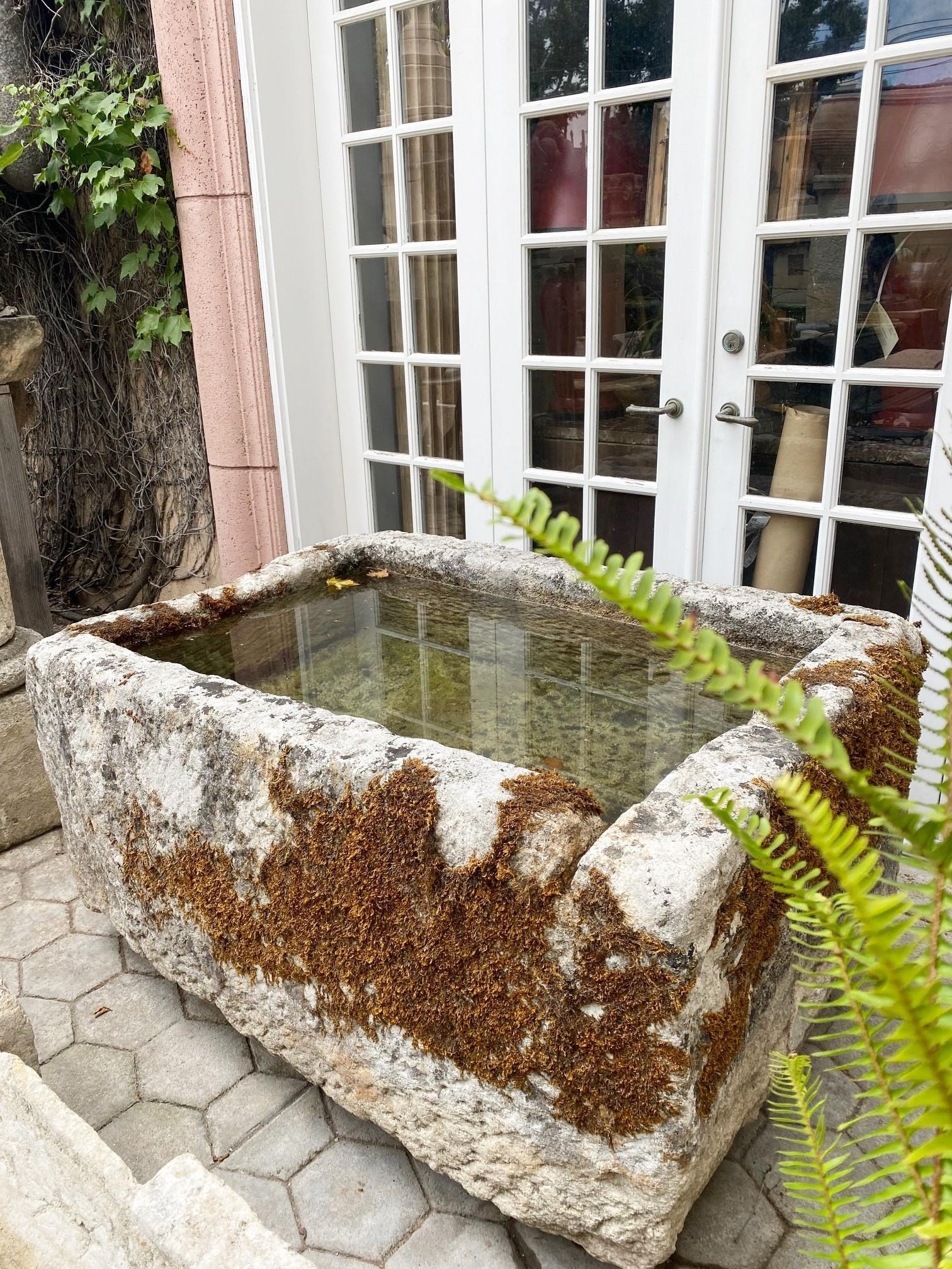Exquisite late 17th Early 18th Century water fountain Basin Of Hand Carved Stone. This trough could be installed with a simple bronze spout or a carved stone fountain head , we have many options of them , in order to create a charming garden water