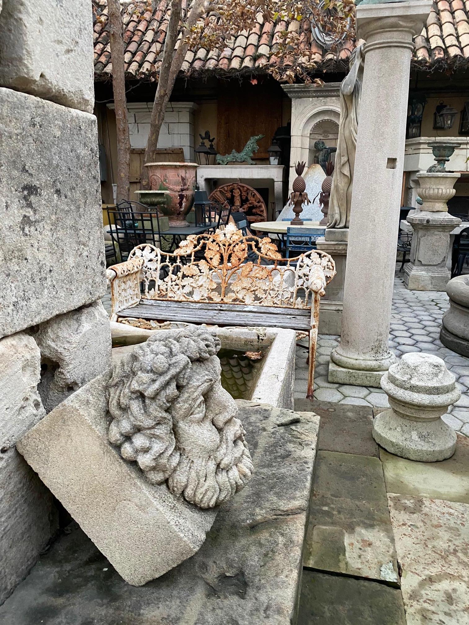 A beautiful Sculpture hand carved fountain head of probably Hercules. It could be installed with a simple water spout or as is. You can pair it with a stone trough basin to create a charming garden water fountain feature we have many available