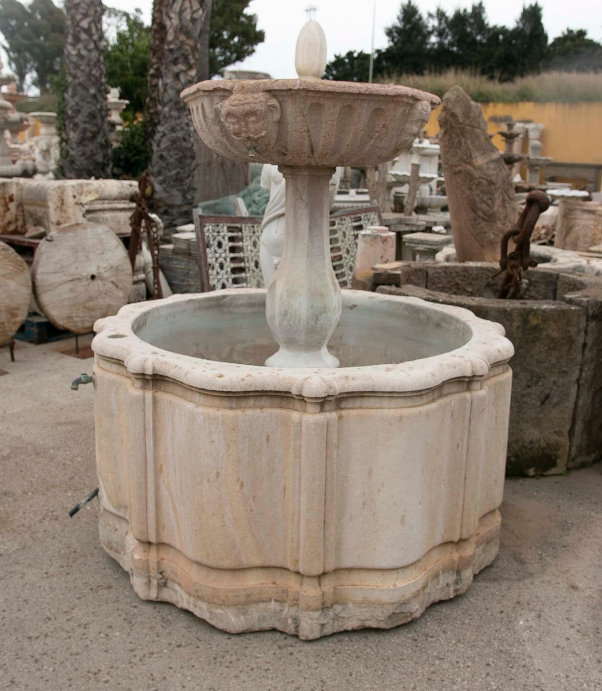 Hand-Carved Stone Fountain with a Plate Decorated with Faces In Good Condition For Sale In Marbella, ES