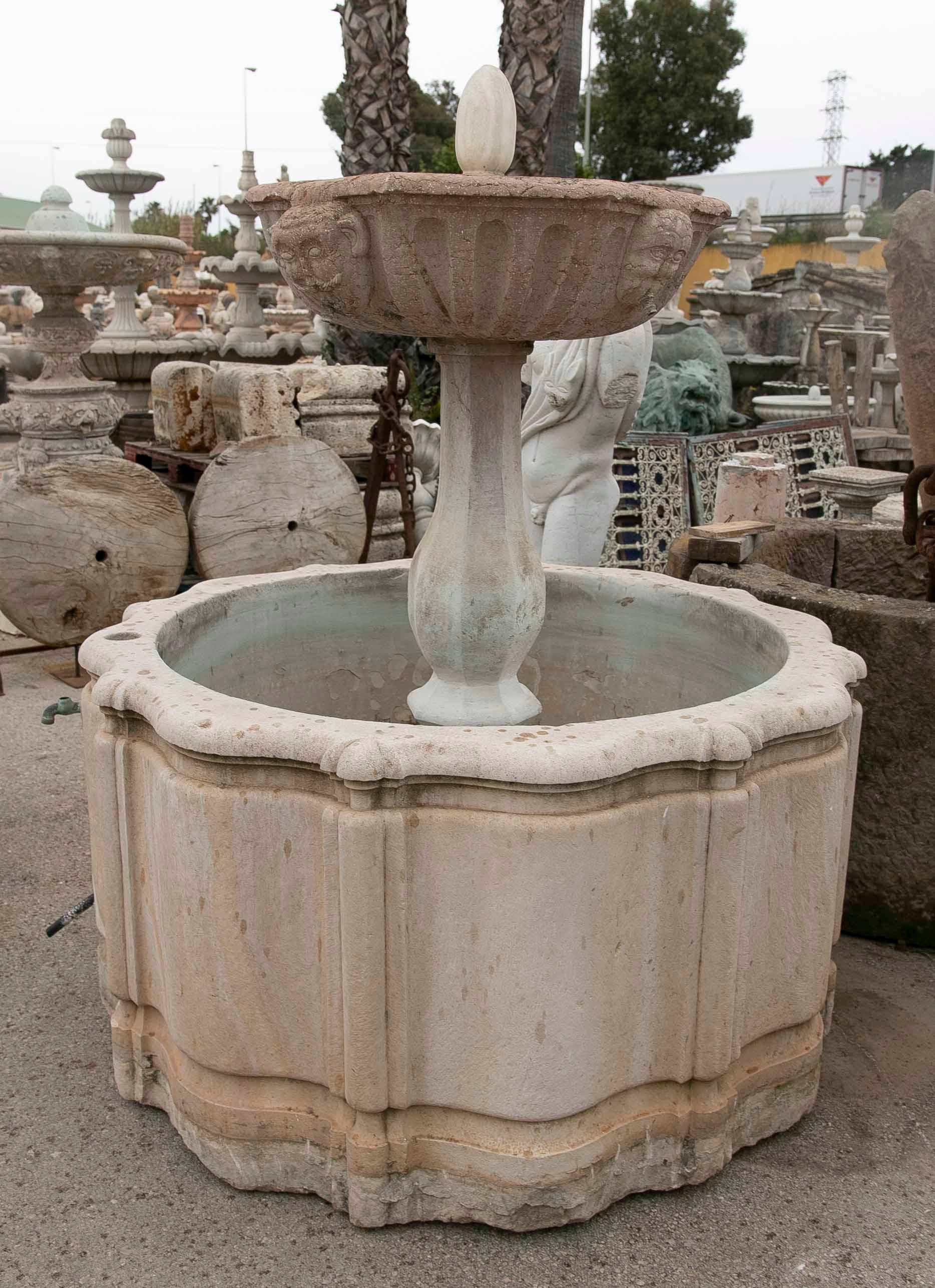 Hand-Carved Stone Fountain with a Plate Decorated with Faces For Sale 1