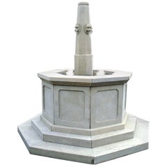 Hand Carved Stone Fountain with Lion Head Spouts in the Style of Venetian Wells