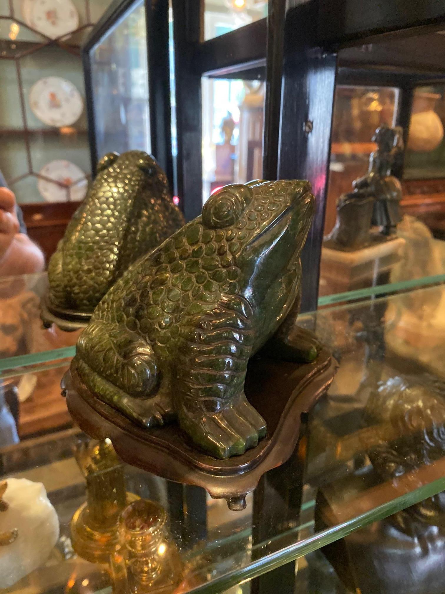 Hand Carved Stone Possible malachite Paperweight office Desk Sculpture object 
A nicely hand carved Hardstone paperweight sculpture frog object decorative antique gift, sitting on a carved wood base
As a special gift item object to add a touch of