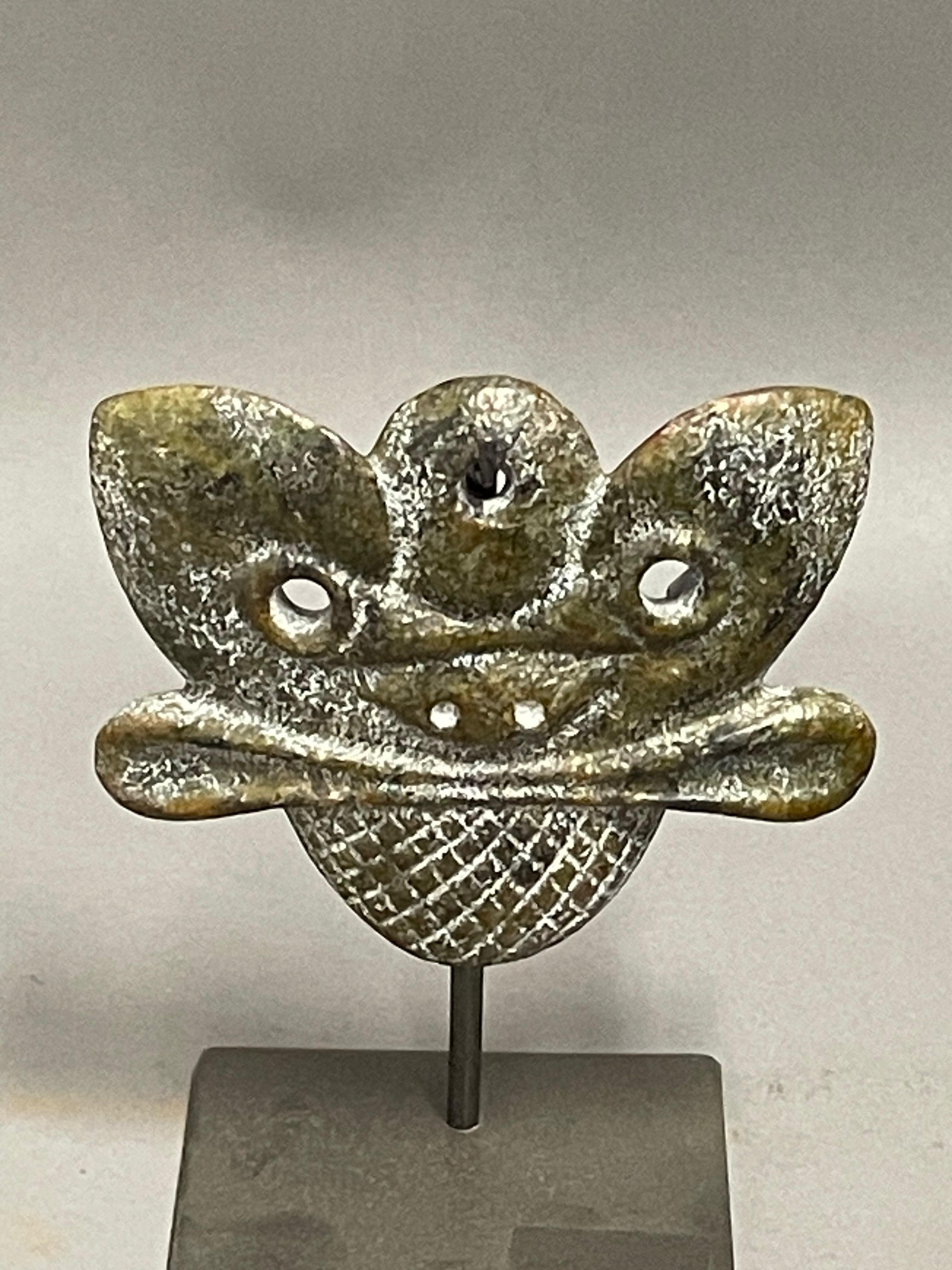 Contemporary Chinese hand carved stone mask on metal stand.
Stand measures   4