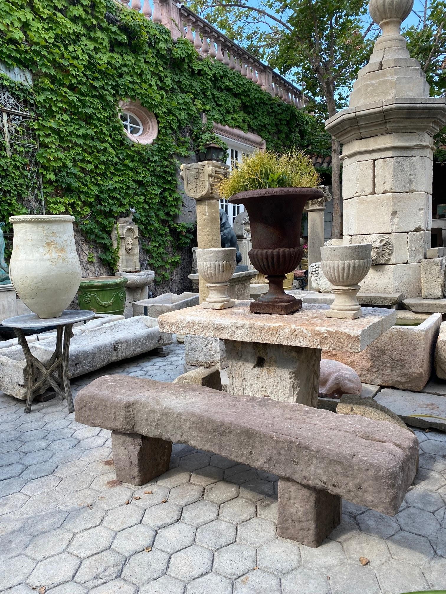 carved stone bench