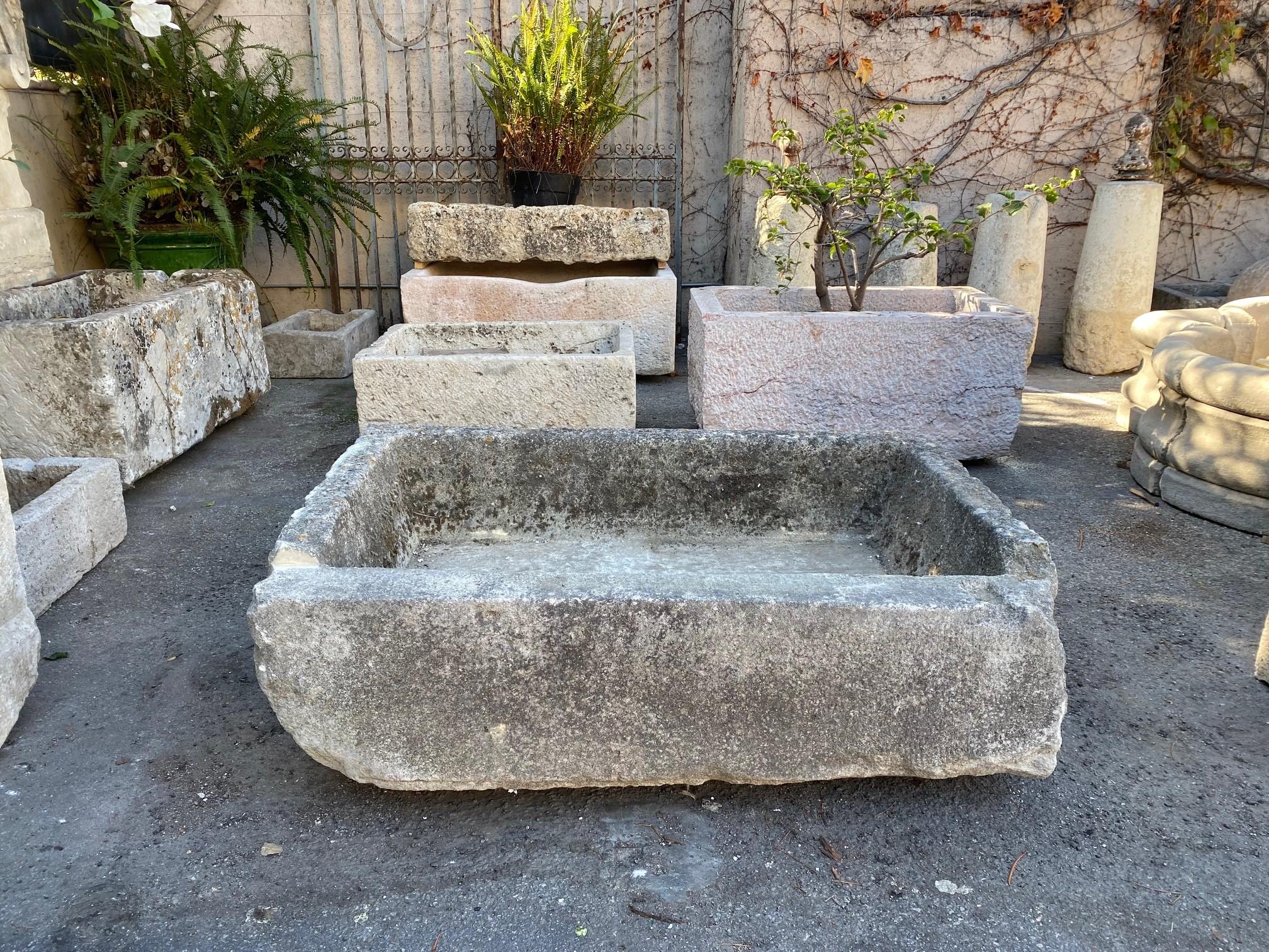 18th century water fountain Lavoir basin Tub of hand carved stone. This trough could be installed with a simple bronze spout or a carved stone fountain head, we have many options of them, creating a charming garden water fountain . This good size