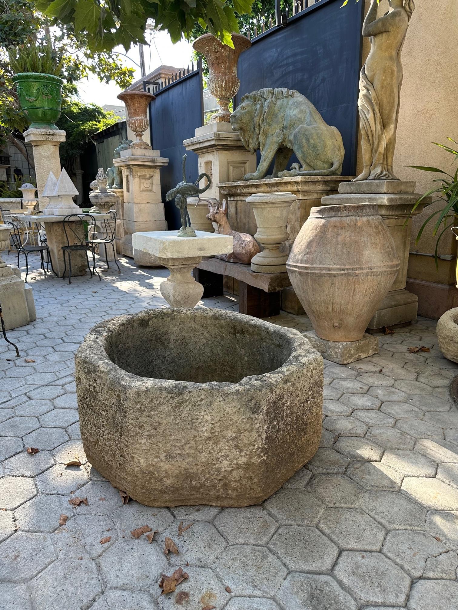 Hand Carved Stone Wellhead center Fountain Basin Antique Fire Pit planter LA CA . A nice hand carved Stone 17th/18th Century well head Octagon shape 8 sided . 
The Simple architectural forms square round triangle rectangle Hexagonal and octagonal in