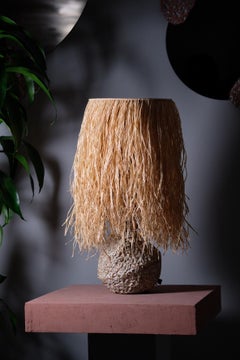 Hand Carved Stoneware Pacific Table Lamp with Raffia Shade by LGS Studio