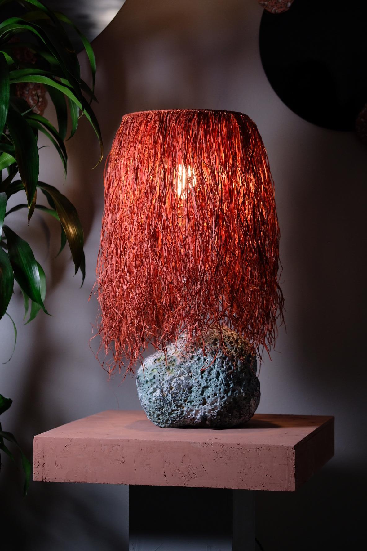 Contemporary Hand Carved Stoneware Pacific Table Lamp with Raffia Shade by LGS Studio For Sale