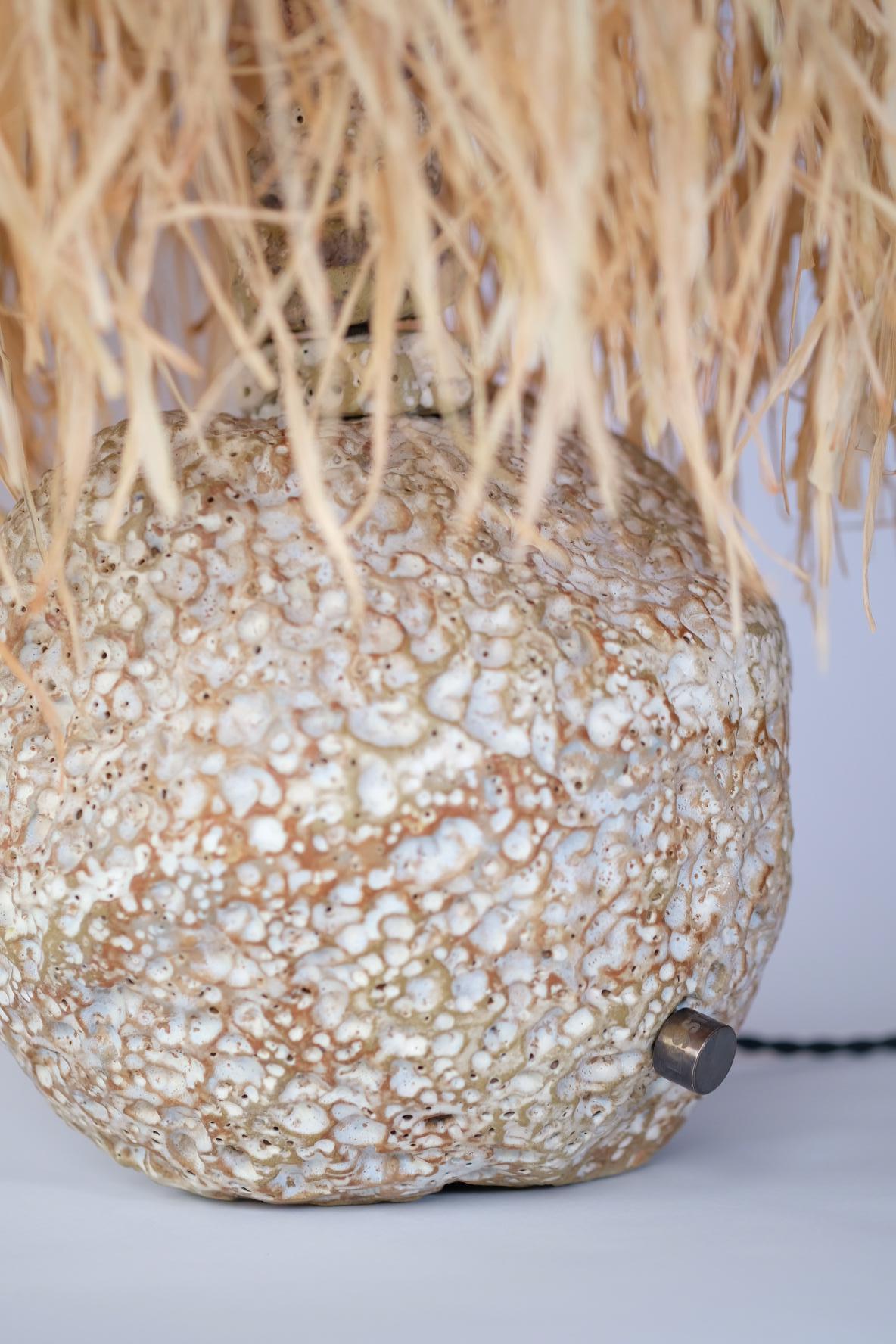 Ceramic Hand Carved Stoneware Pacific Table Lamp with Raffia Shade by LGS Studio For Sale