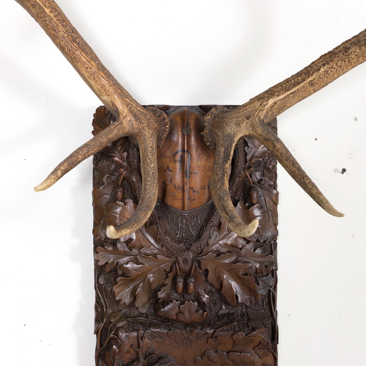 Hand Carved Swiss Black Forest Trophy Plaque with Antlers In Good Condition In Birmingham, AL