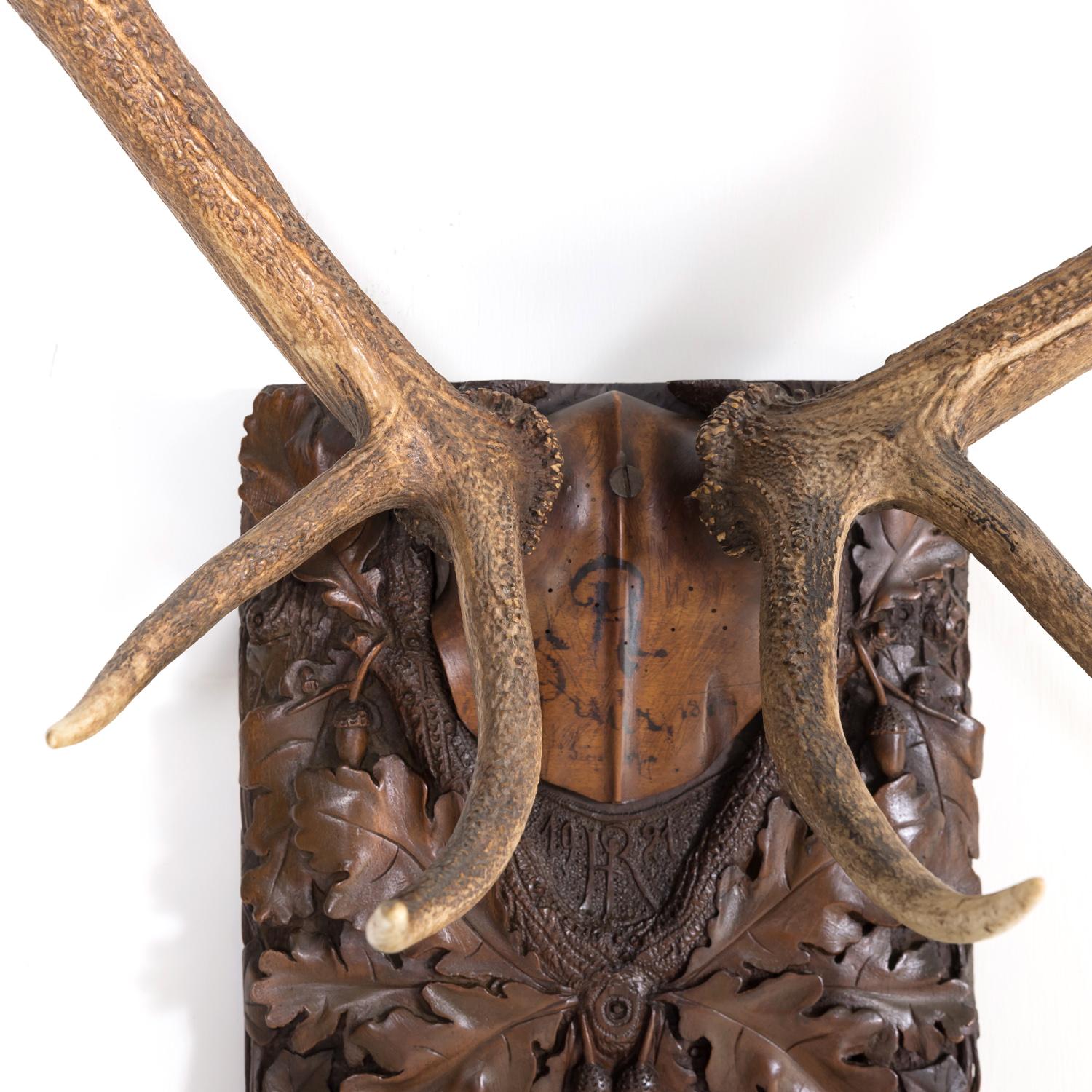 20th Century Hand Carved Swiss Black Forest Trophy Plaque with Antlers