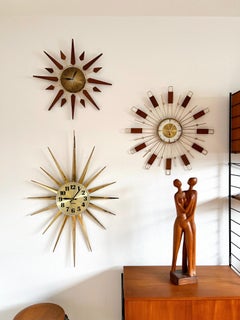 Hand-carved Teak hugging couple sculpture