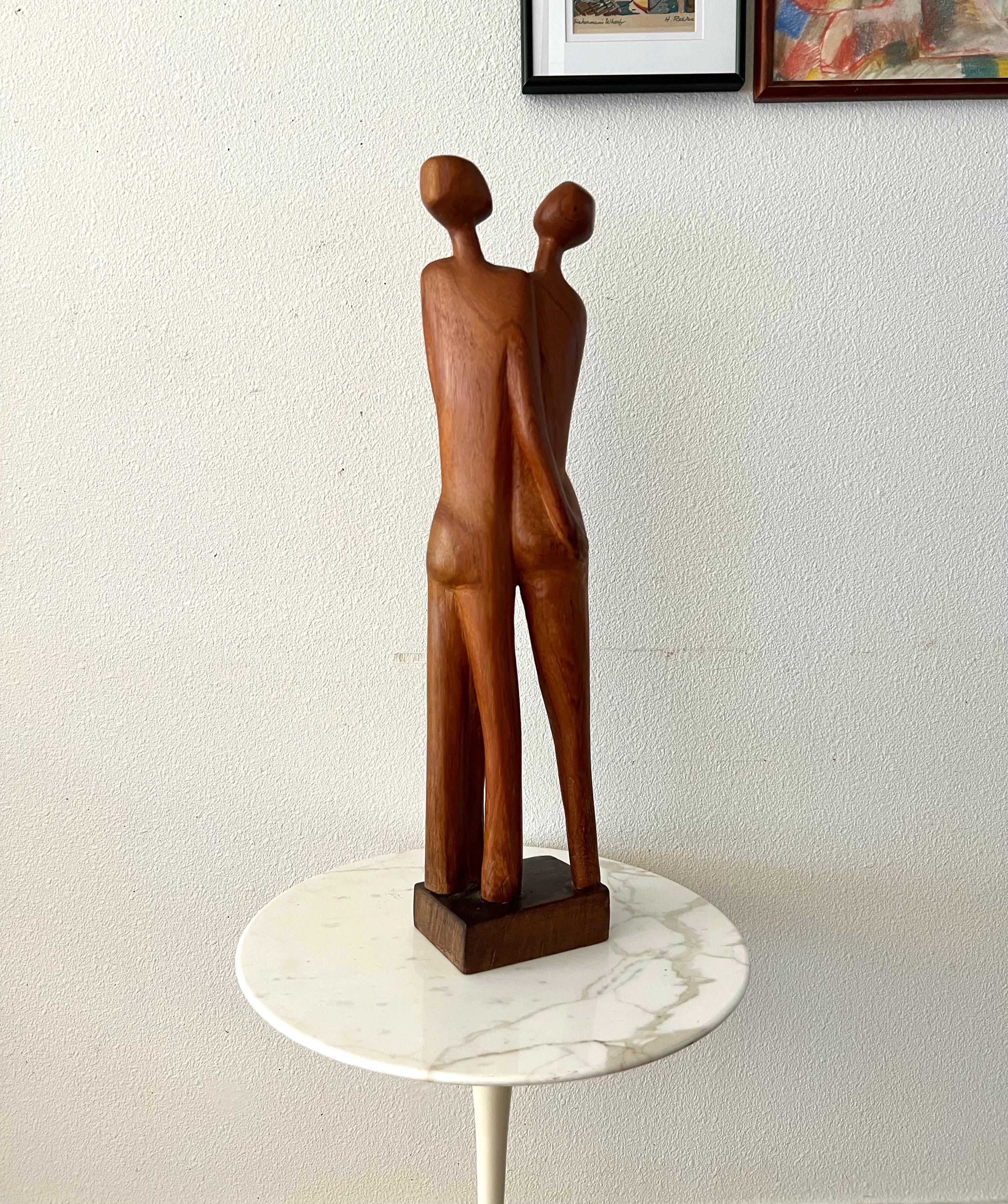 Mid-Century Modern Hand-carved Teak hugging couple sculpture  For Sale