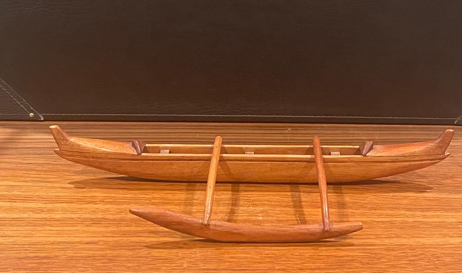 Hand Carved Teak Outrigger Canoe Sculpture In Good Condition In San Diego, CA