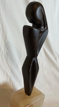 Hand carved Teak sculpture on alabaster base
