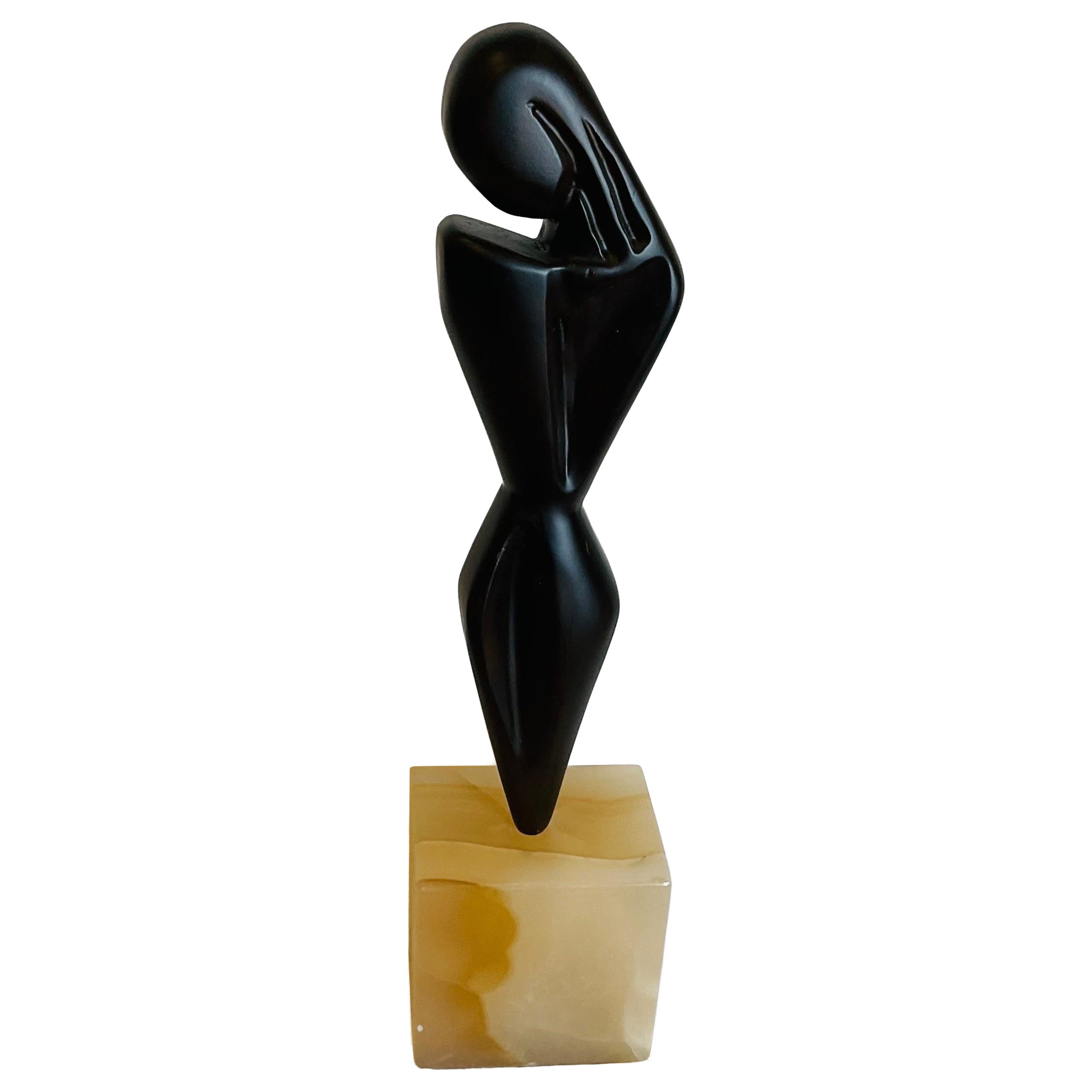 Hand carved Teak sculpture on alabaster base