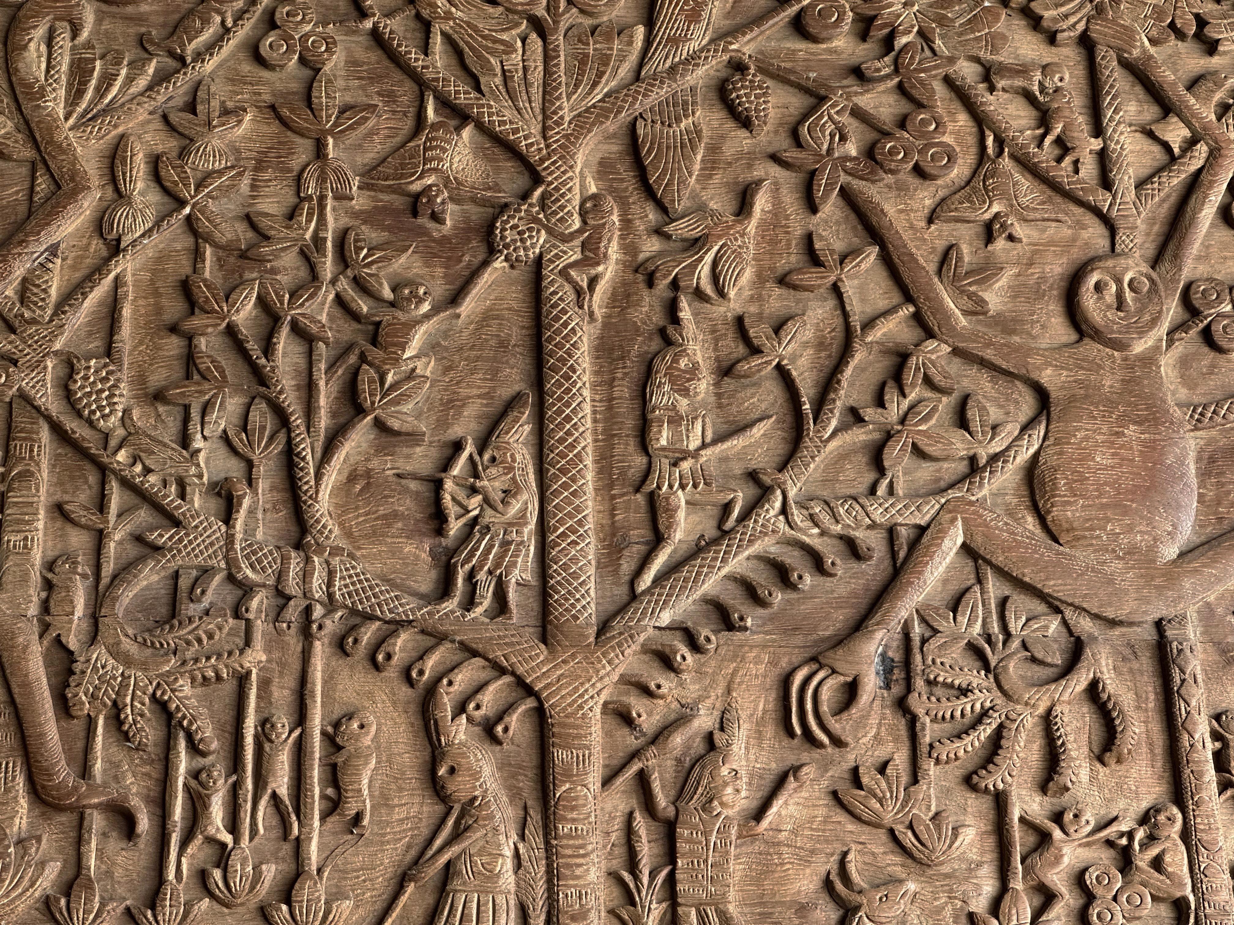 Indonesian Hand-Carved Teak Wood Sculpture Panel Depicting Dayak Mythology For Sale