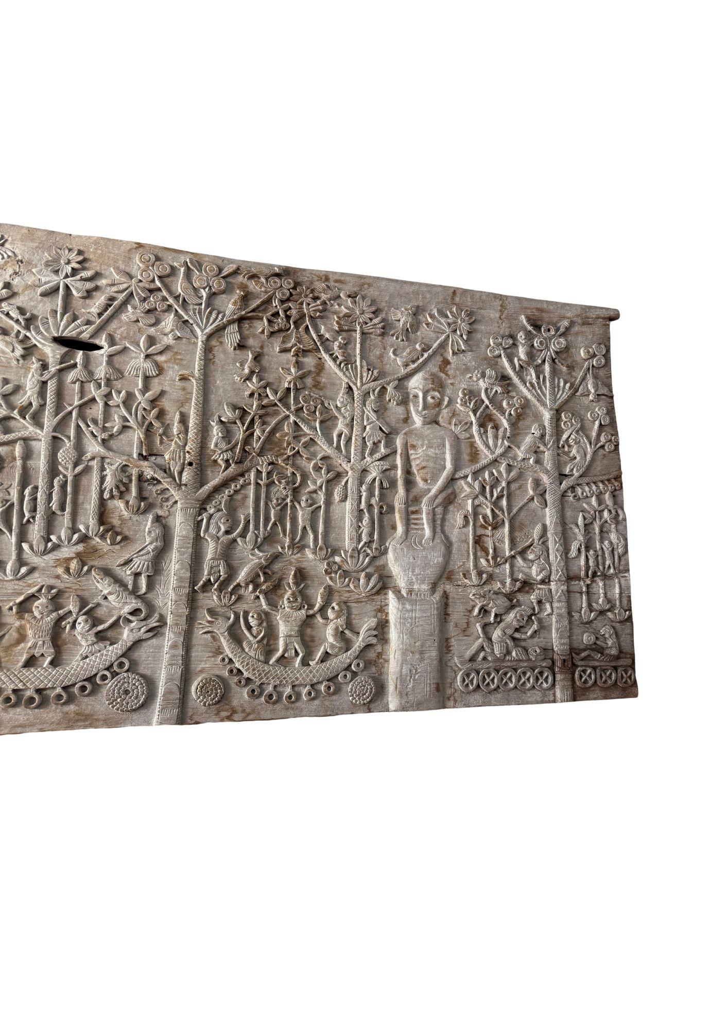 Indonesian Hand-Carved Teak Wood Sculpture Panel Depicting Dayak Mythology For Sale
