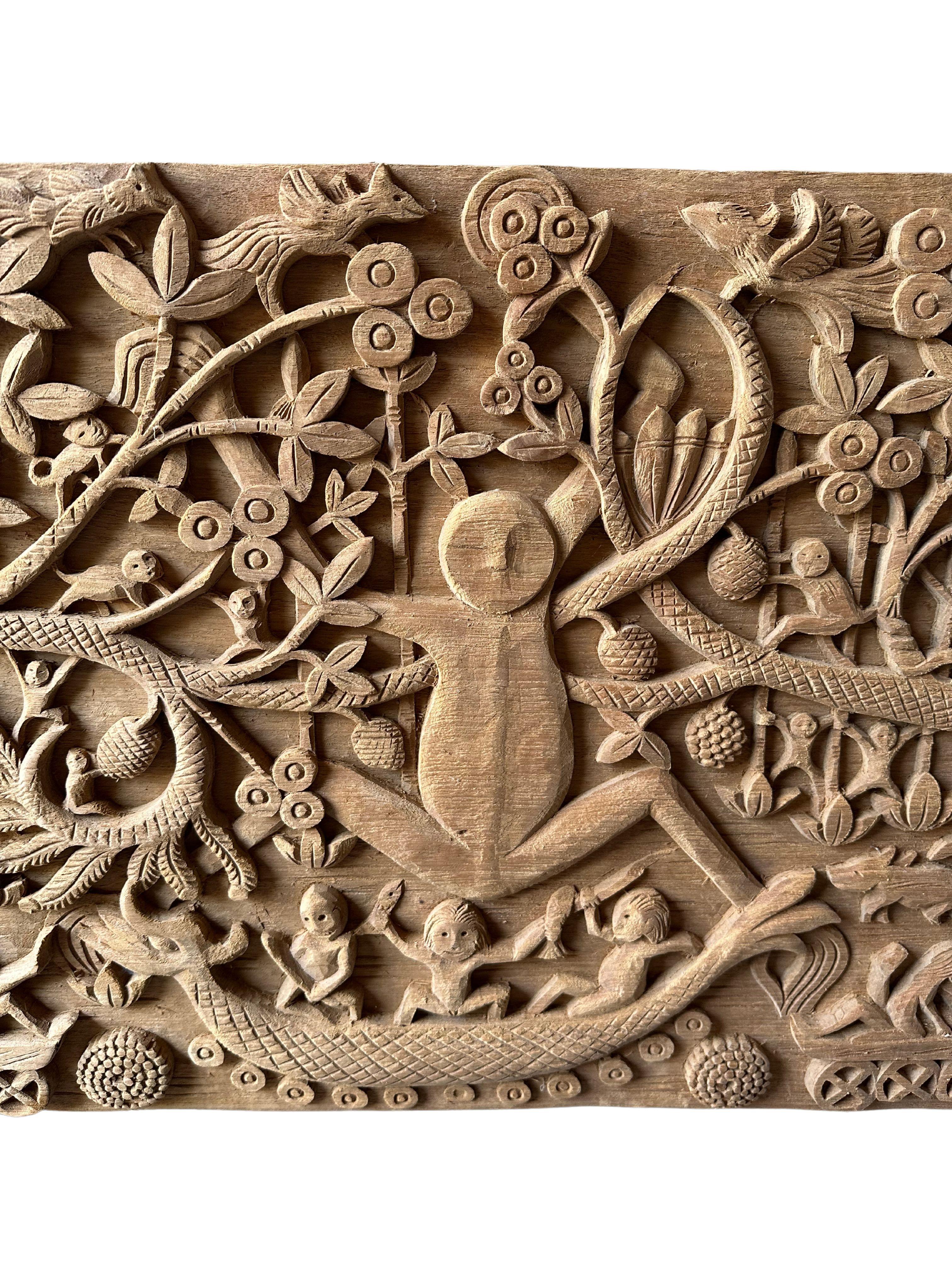Hand-Crafted Hand-Carved Teak Wood Sculpture Panel Depicting Dayak Mythology For Sale