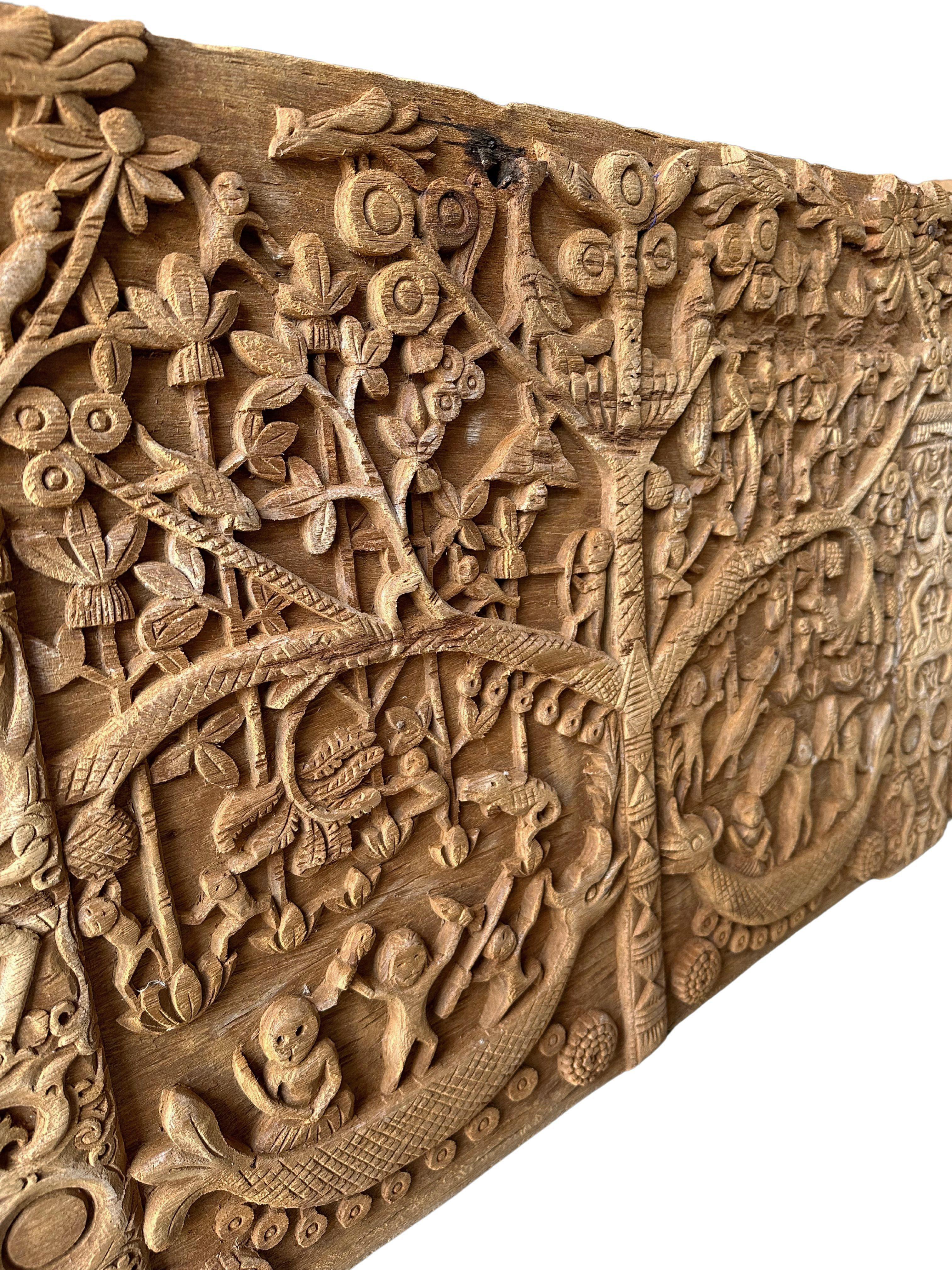 Hand-Crafted Hand-Carved Teak Wood Sculpture Panel Depicting Dayak Mythology For Sale