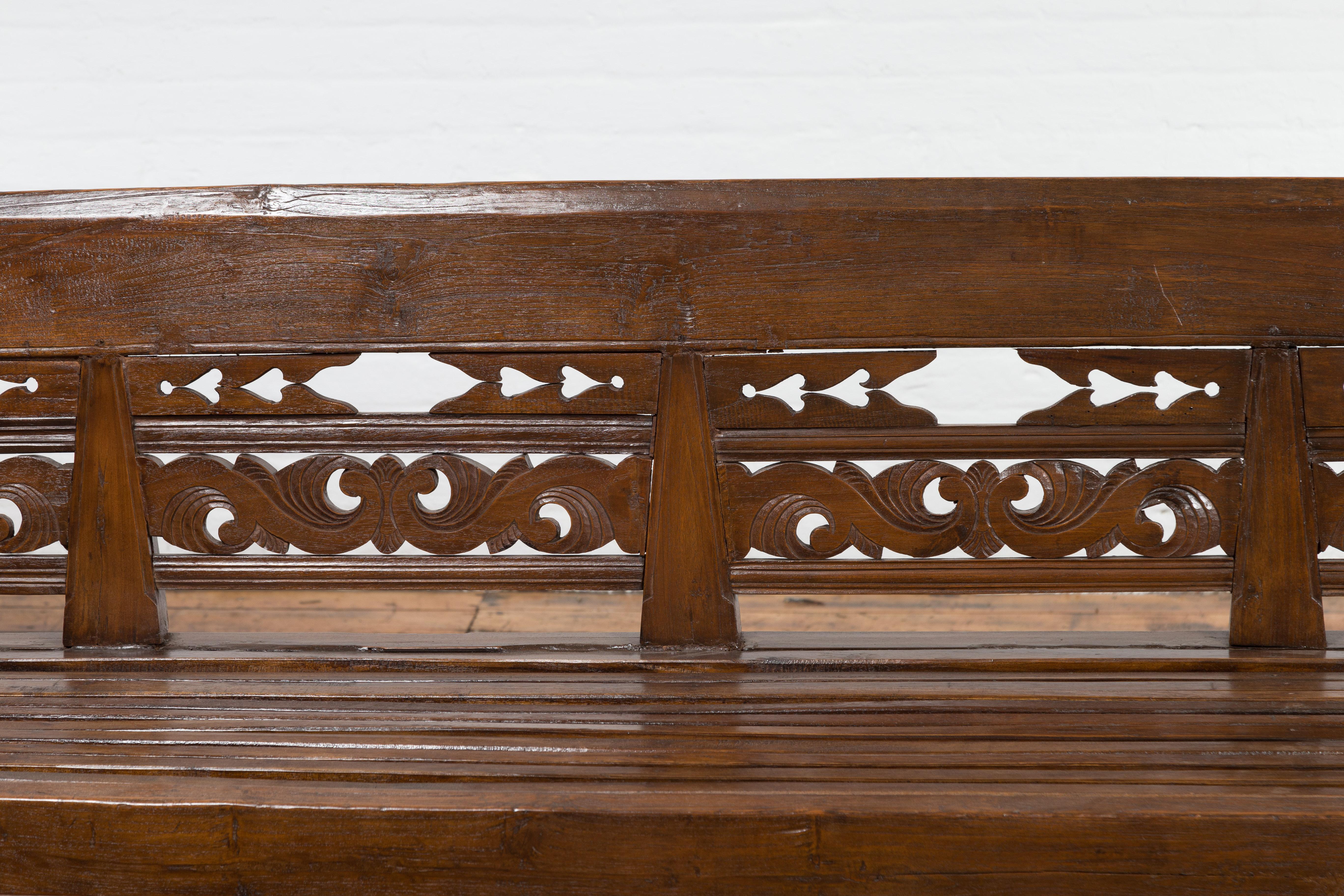 Hand-Carved Hand Carved Teak Wood Settee with Scrolling Foliage and Turned Legs