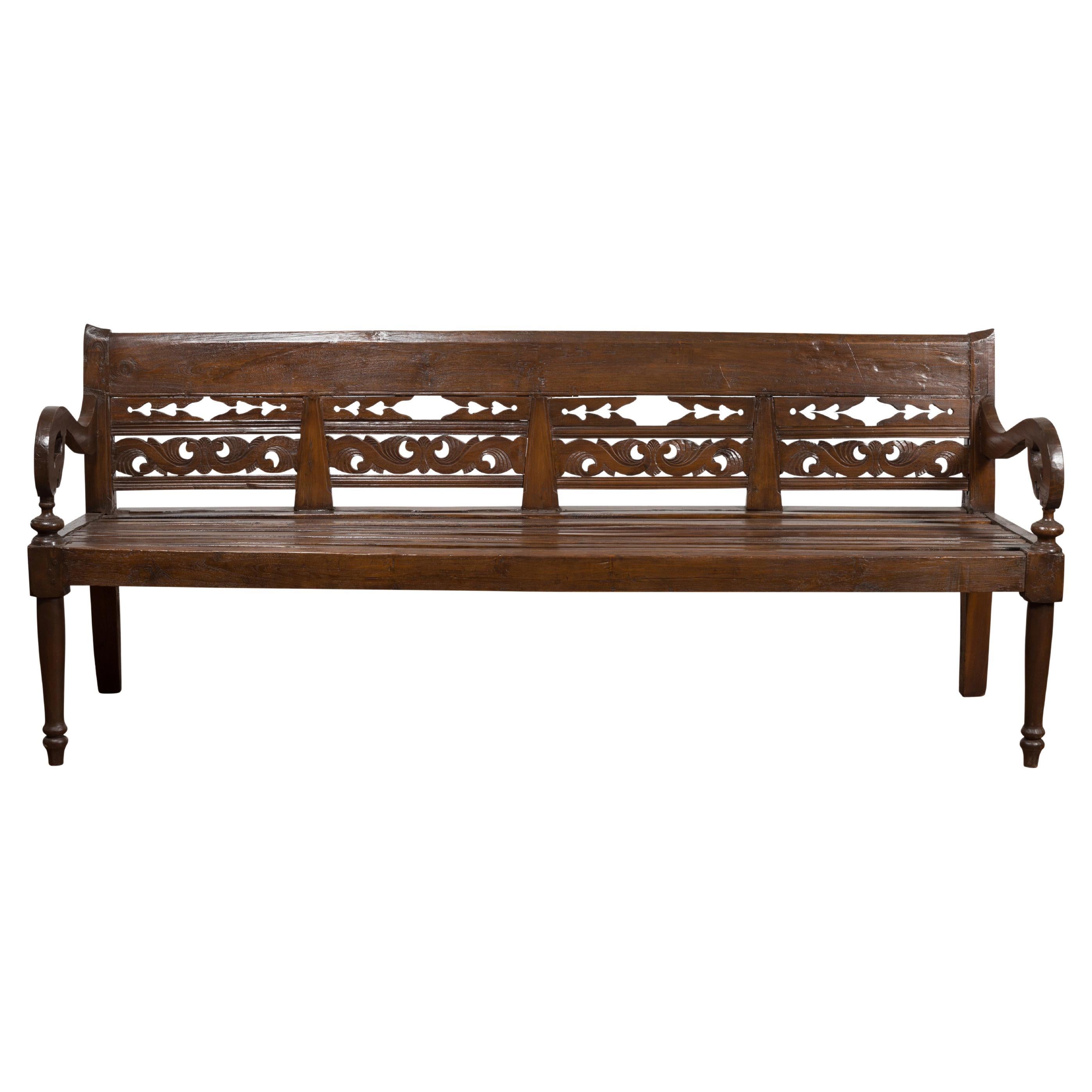 Hand Carved Teak Wood Settee with Scrolling Foliage and Turned Legs