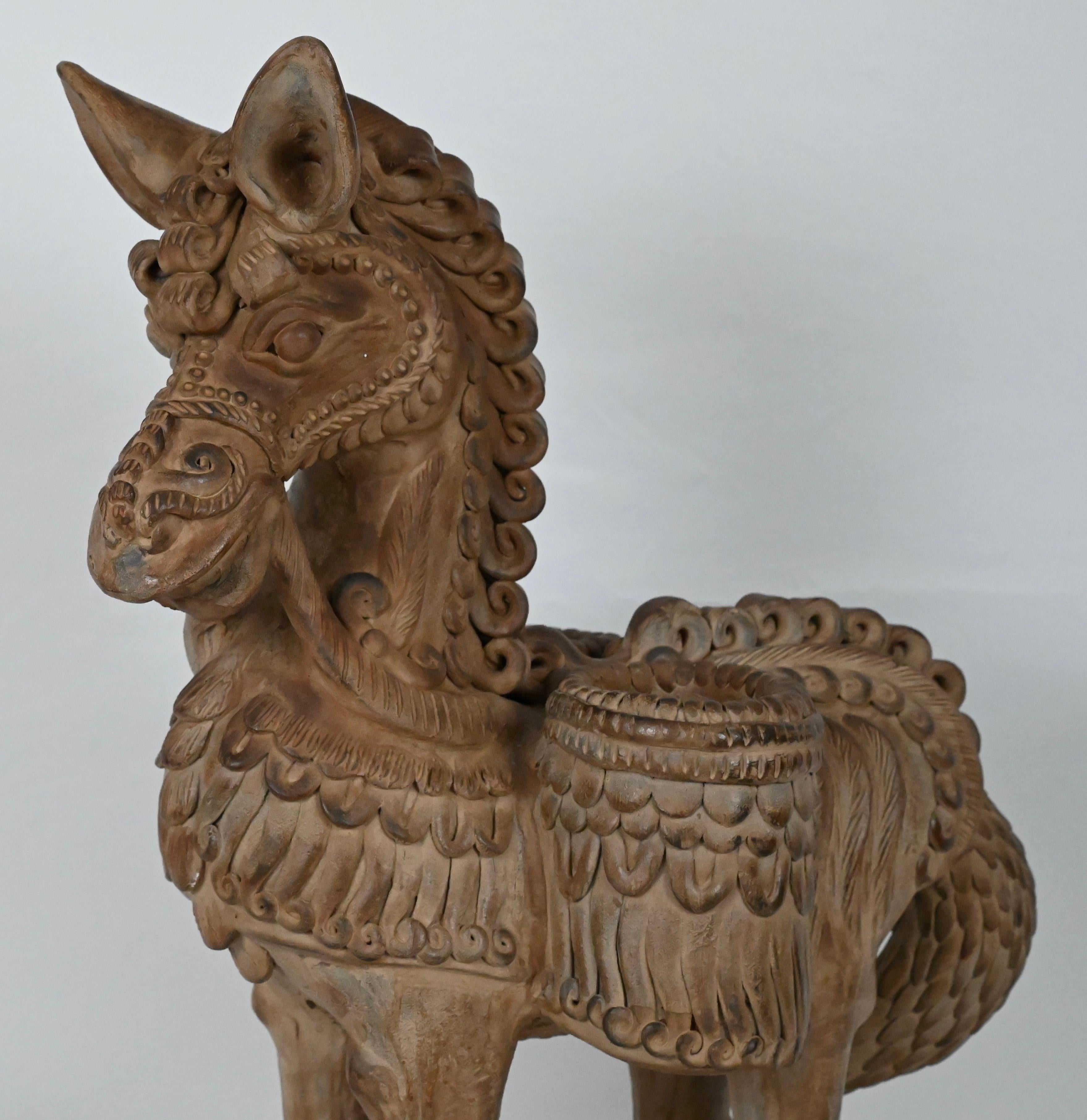 A finely detailed Hand-Carved Terracotta Horse Sculpture by Ugo Zaccagnini.

The wonderfully decorative Ugo Zaccagnini horse sculpture would enhance any setting, Mid-Century Modern, Contemporary, Traditional, Arts & Crafts, Art Deco, Modern, Beach