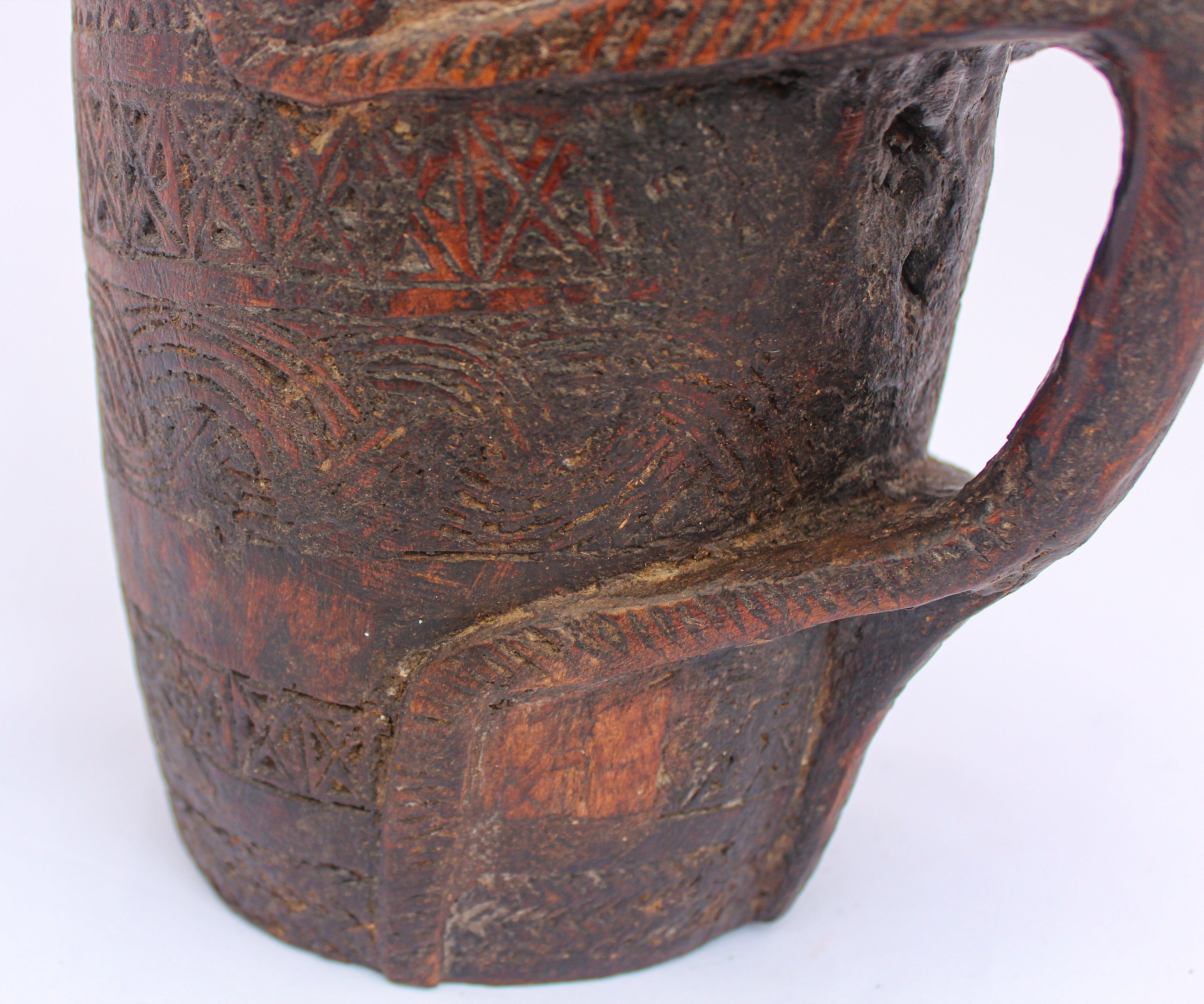 Hand Carved Tribal Wooden Nepalese Beaker Milk Pot with Handle For Sale 6
