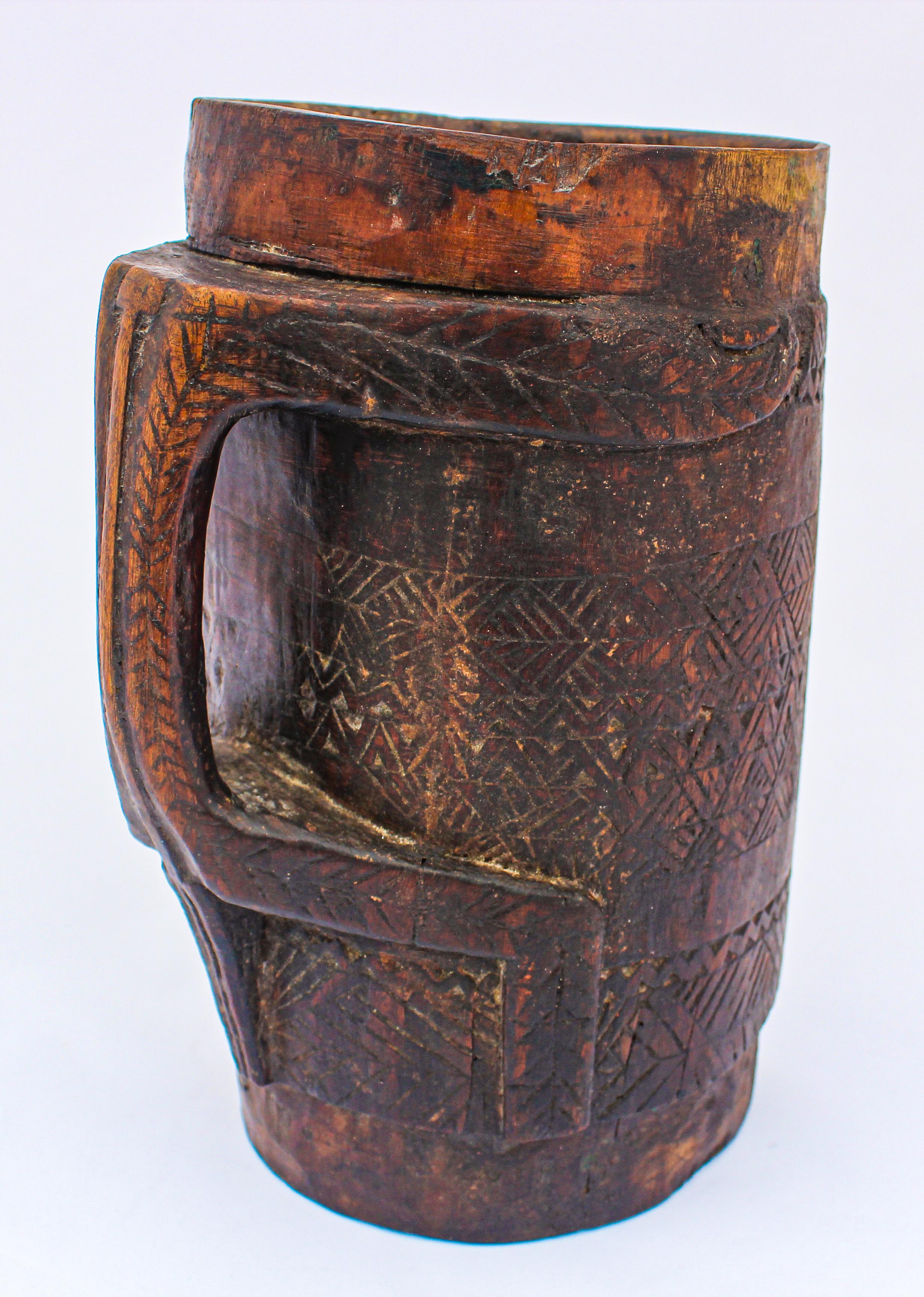 Hand Carved Tribal Wooden Milk Pot from West Nepal In Fair Condition In North Hollywood, CA